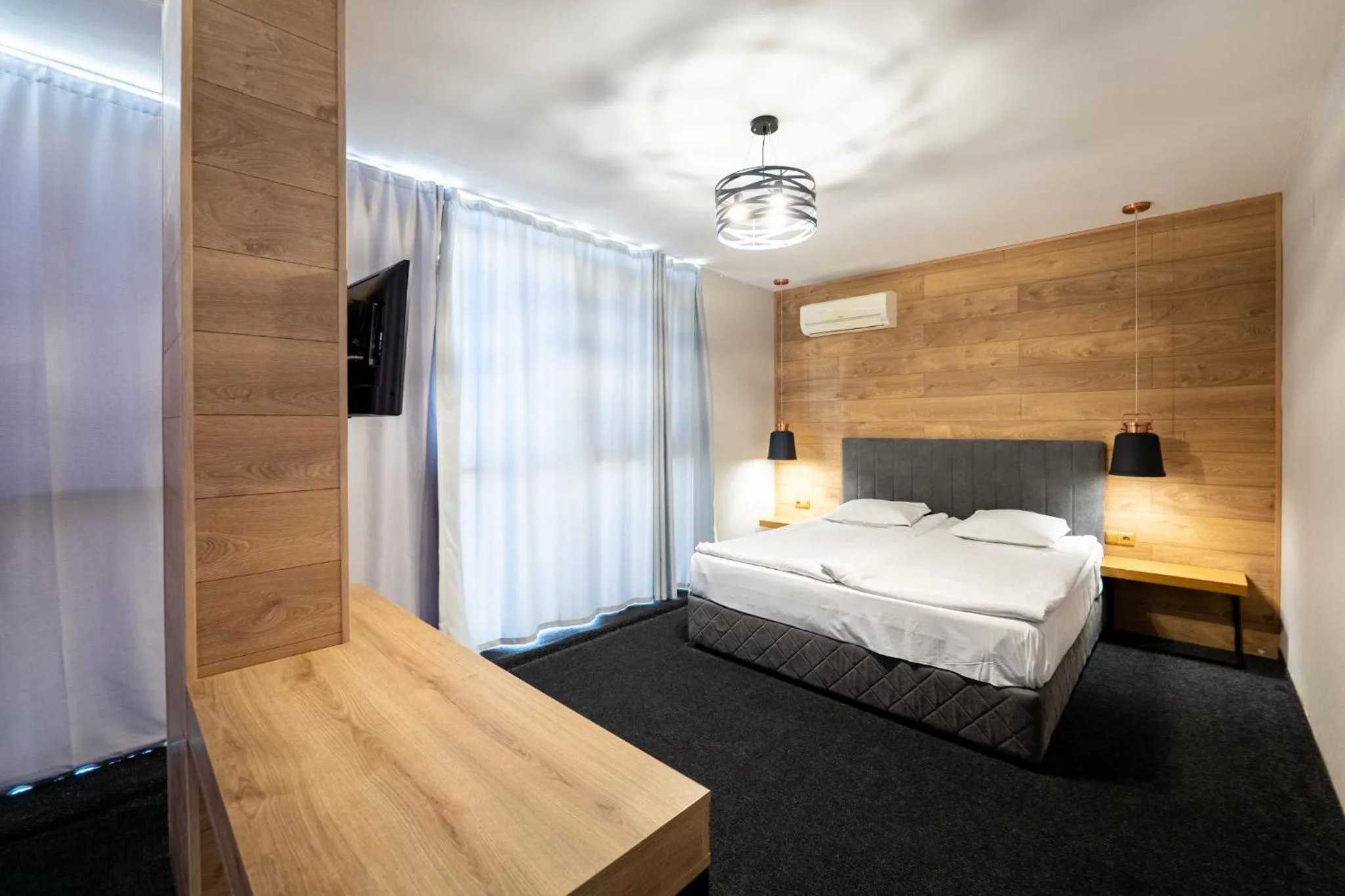 Bed in Avenue Hotel Deluxe