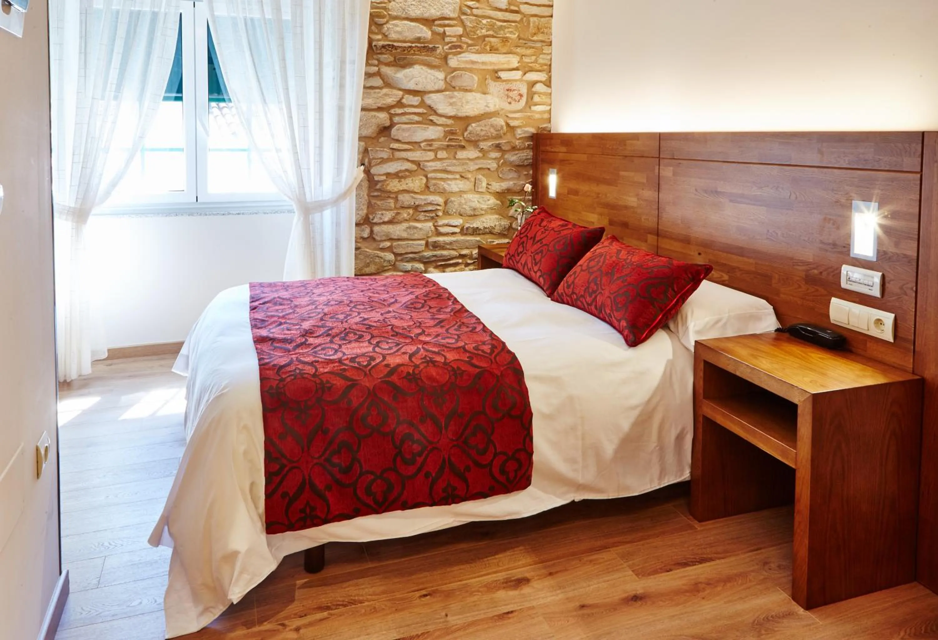 Photo of the whole room, Bed in Mapoula PR Boutique