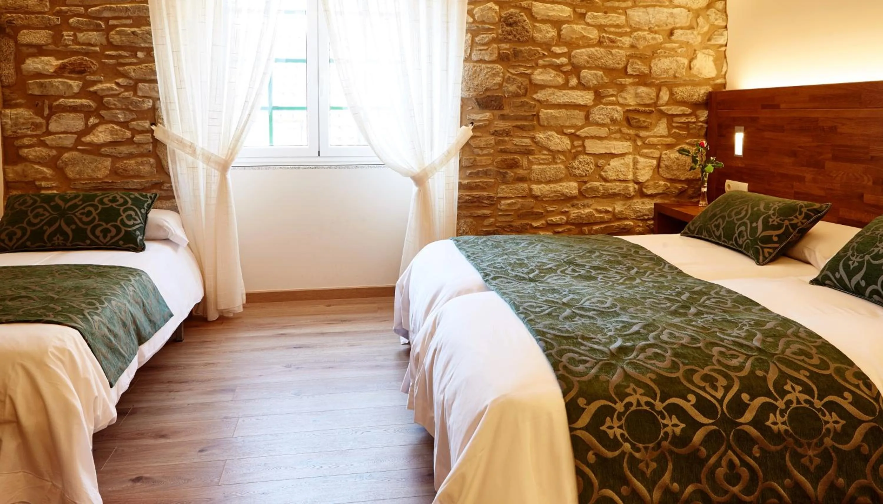 Photo of the whole room, Bed in Mapoula PR Boutique