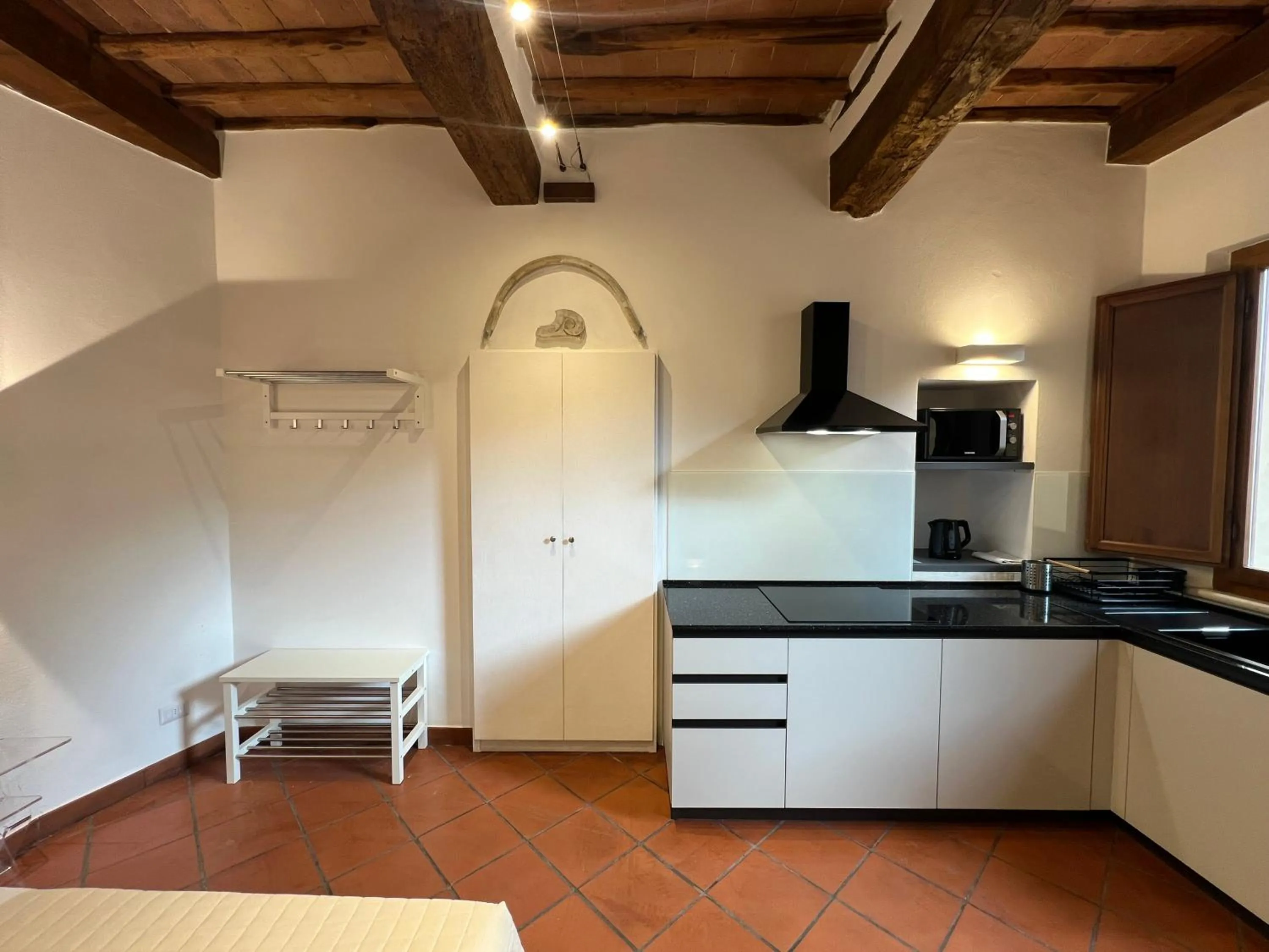 Kitchen or kitchenette in Regis Condo