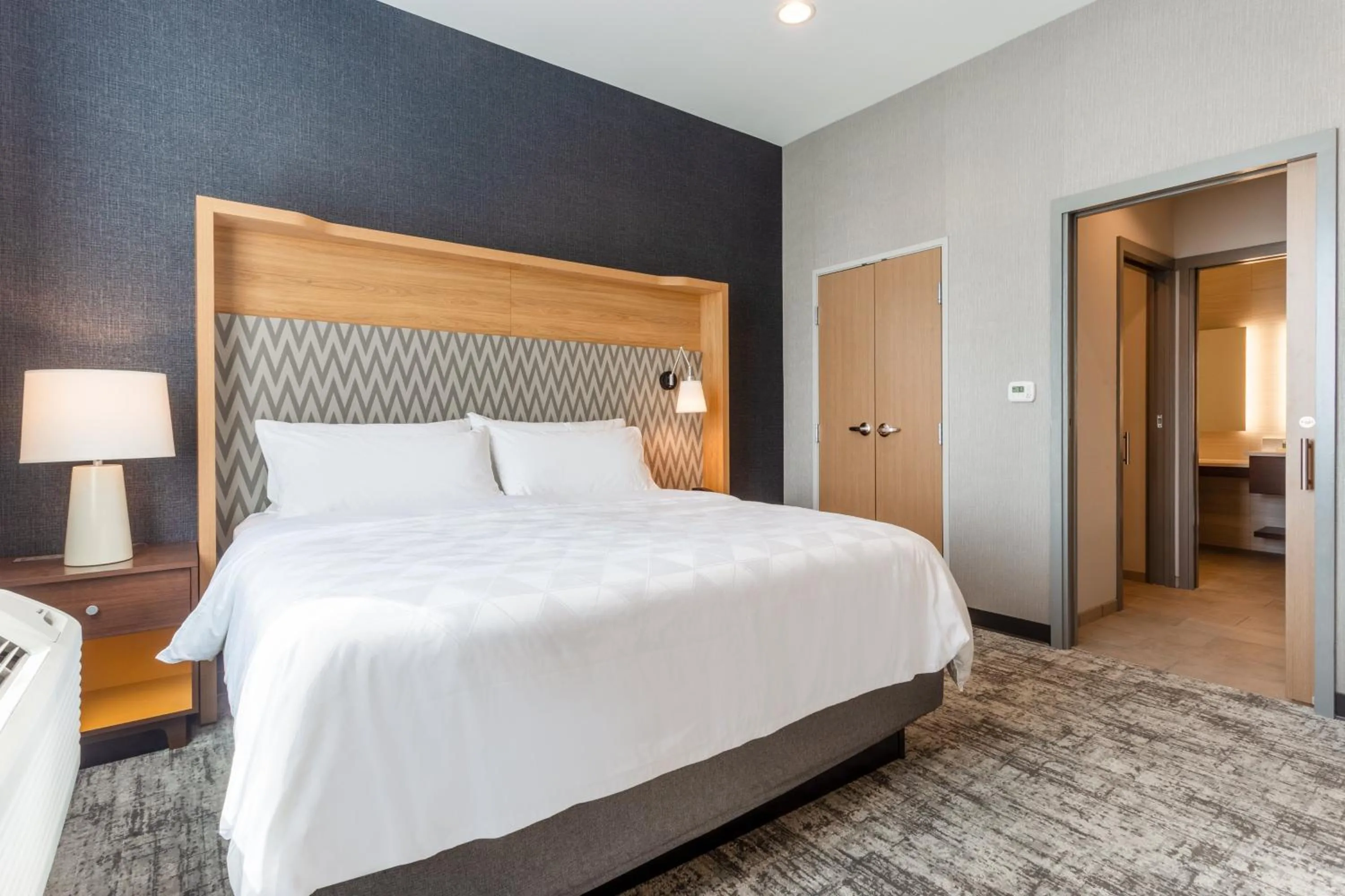 Photo of the whole room, Bed in Holiday Inn & Suites Cedar Falls-Waterloo Event Ctr by IHG