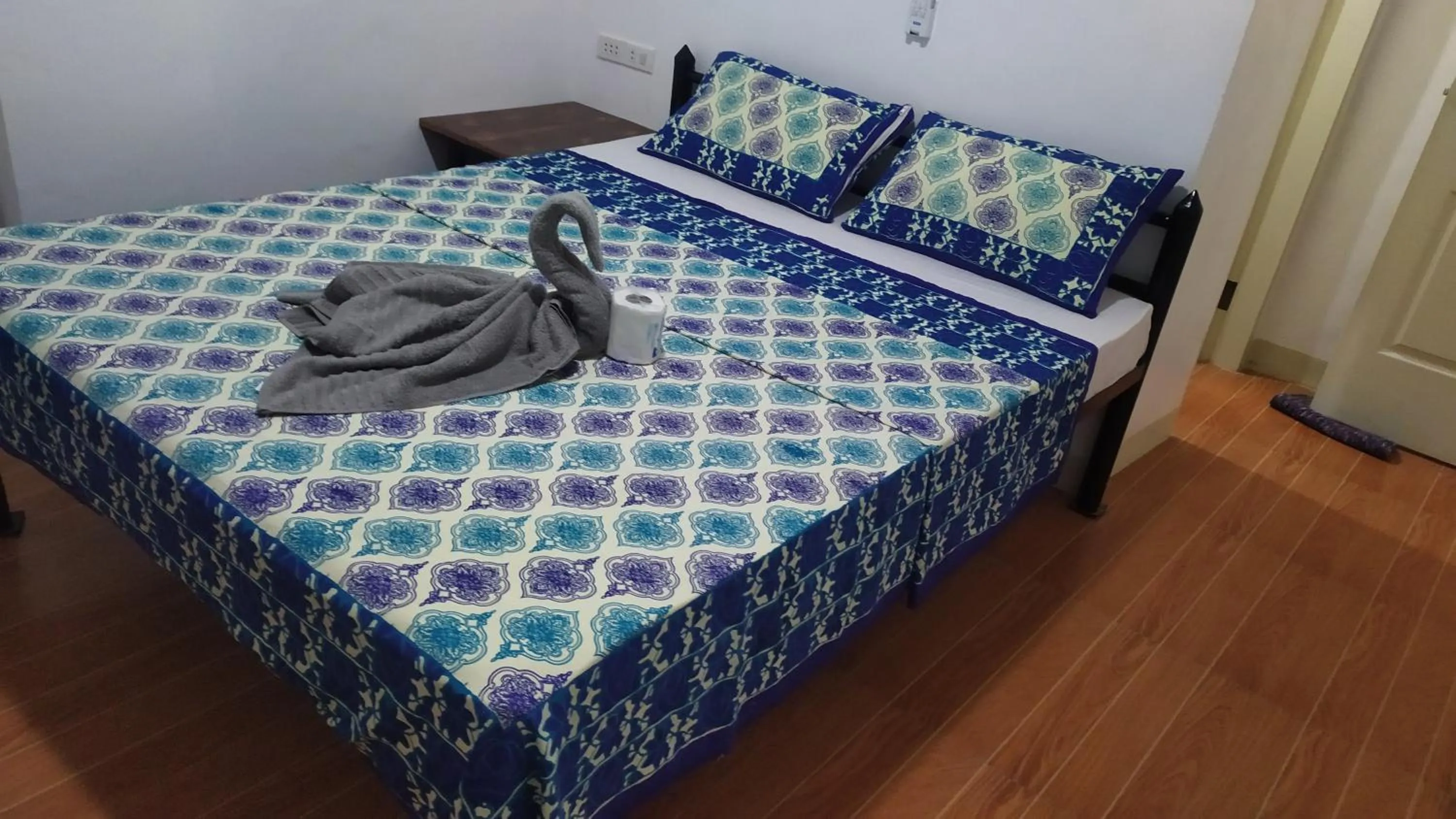 Bed in Hotel Ashoka (Authentic Indian Cuisine)