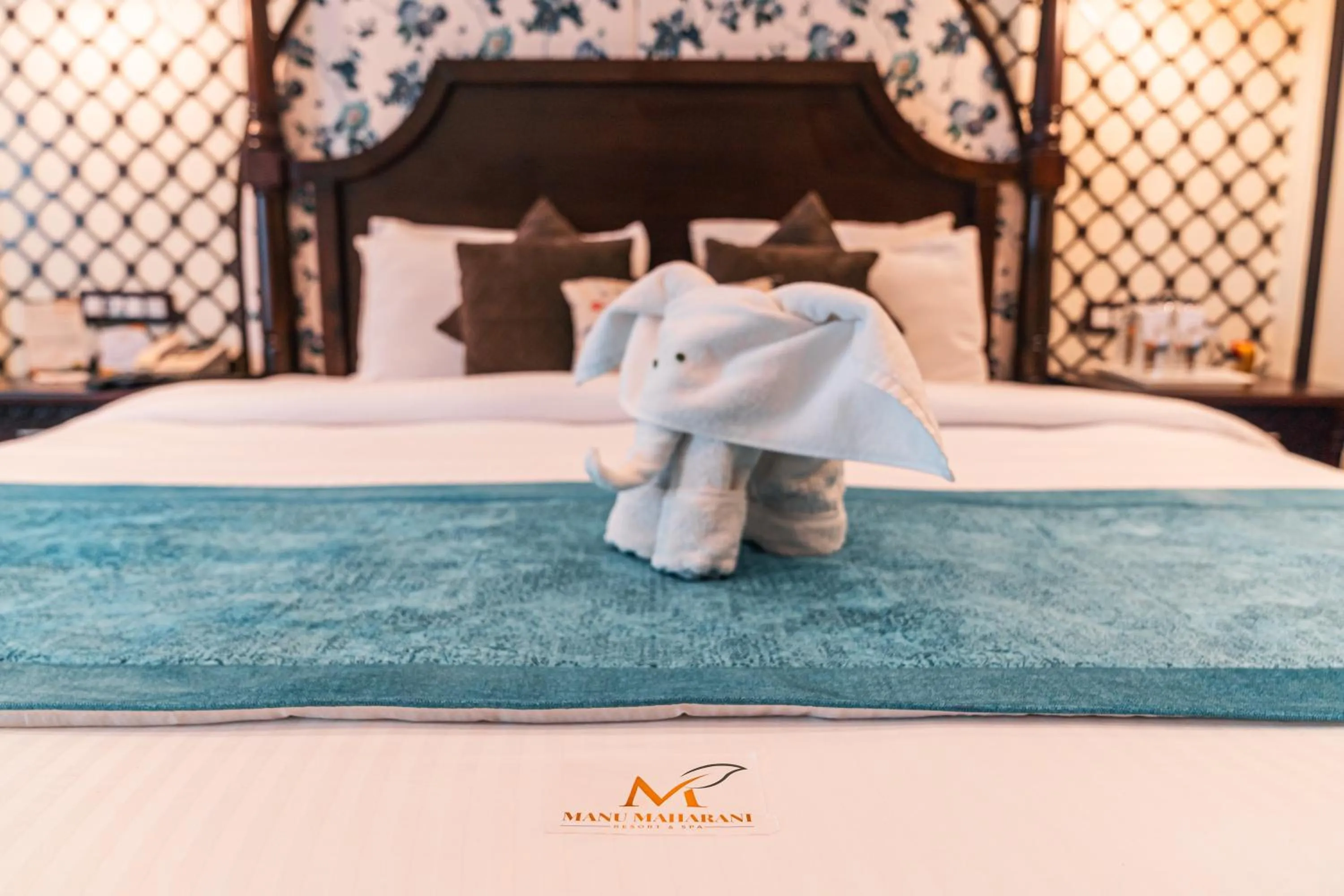 Bed in Manu Maharani Resort