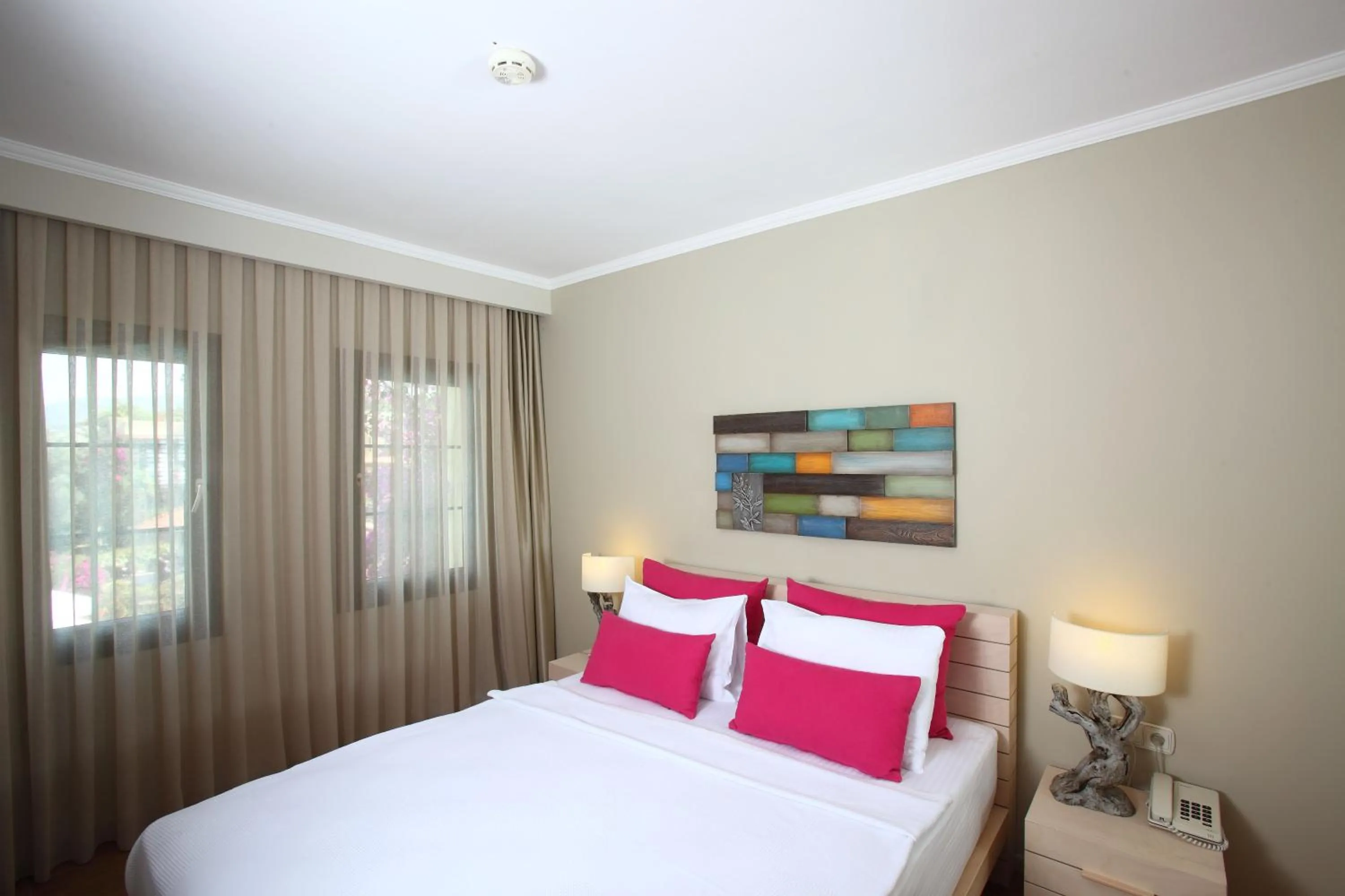 Bed in Zeytinada Hotel