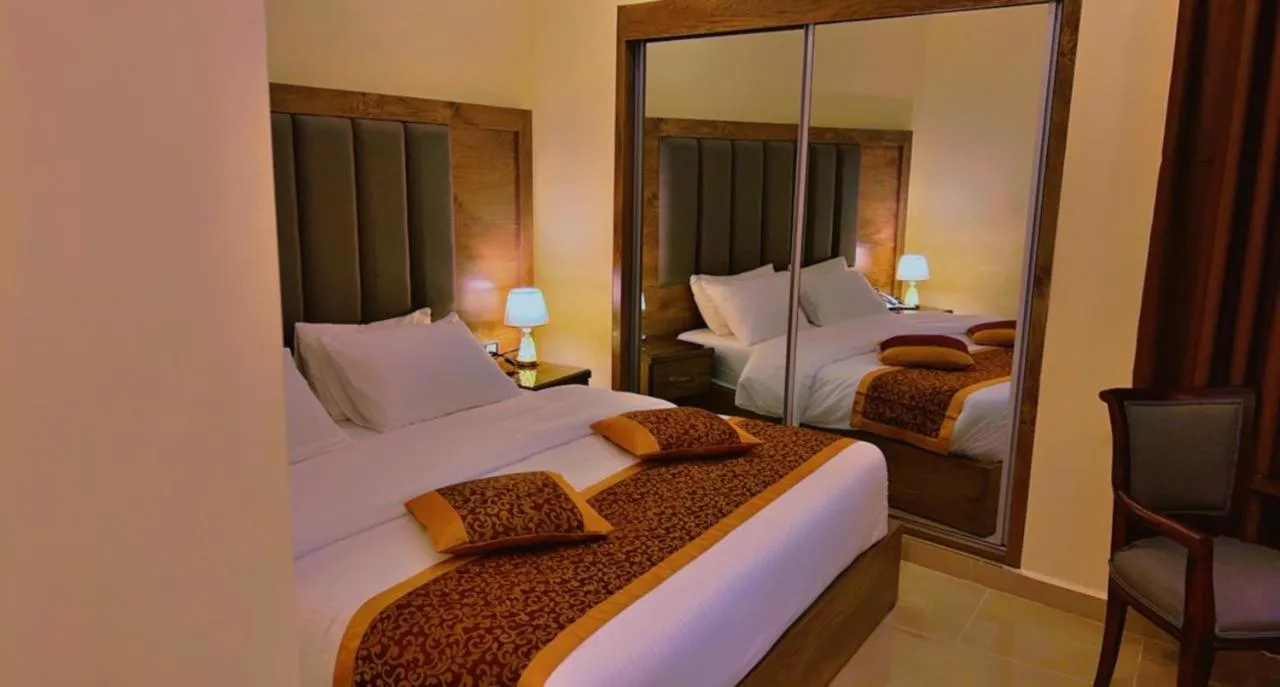Bed in Shaqilath Hotel