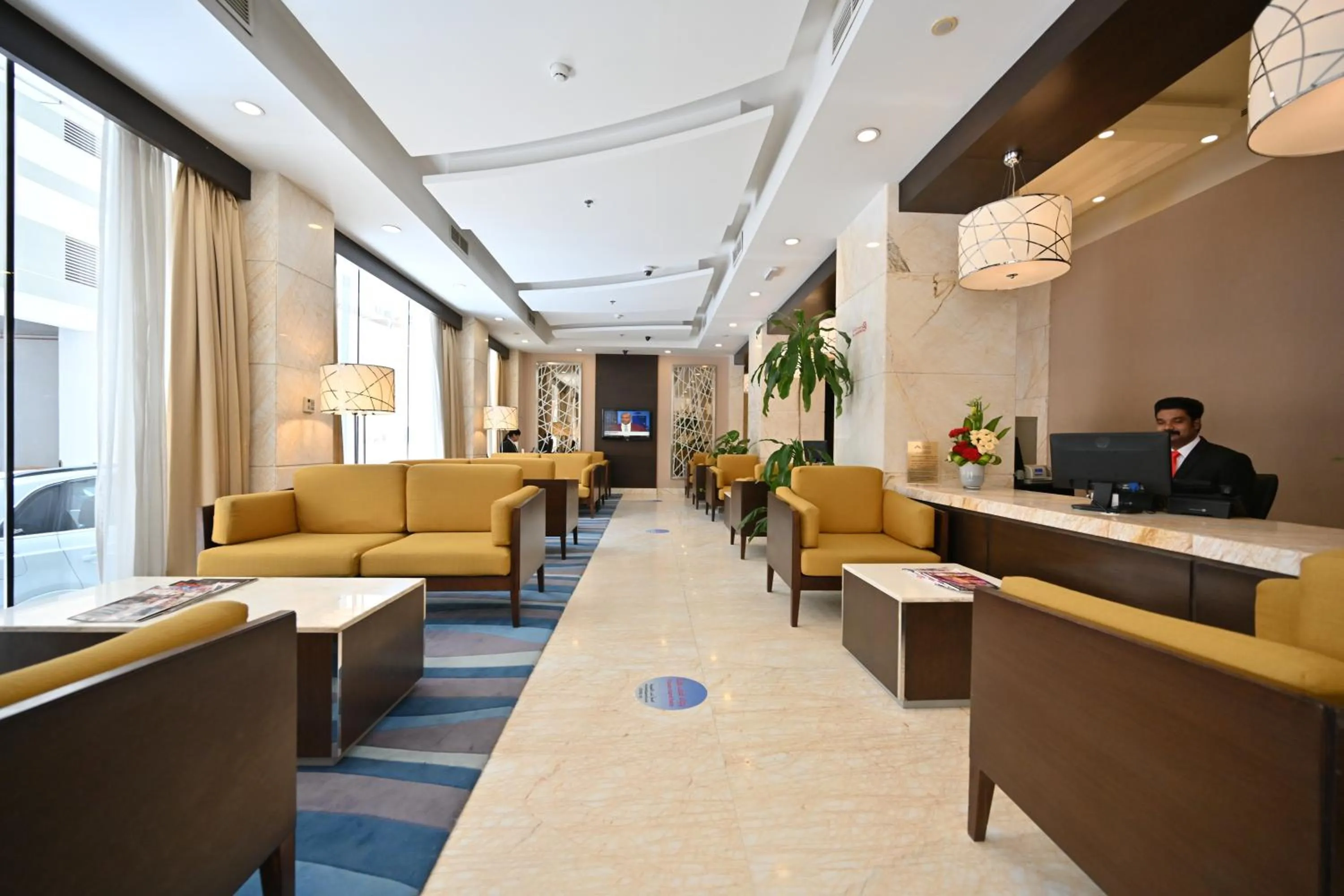 Lobby or reception in Harbour Suites Hotel
