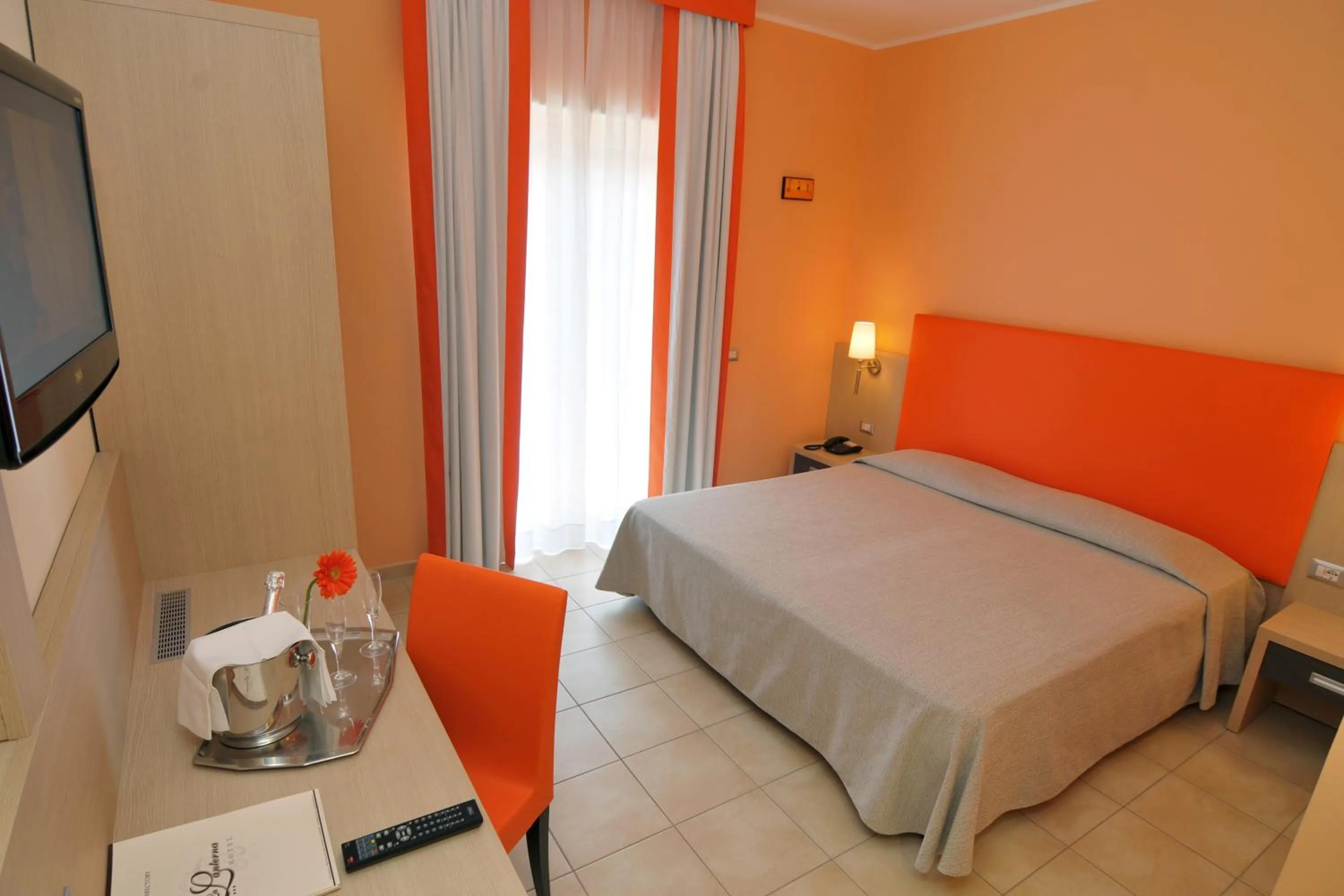 Bedroom, Bed in La Lanterna Hotel