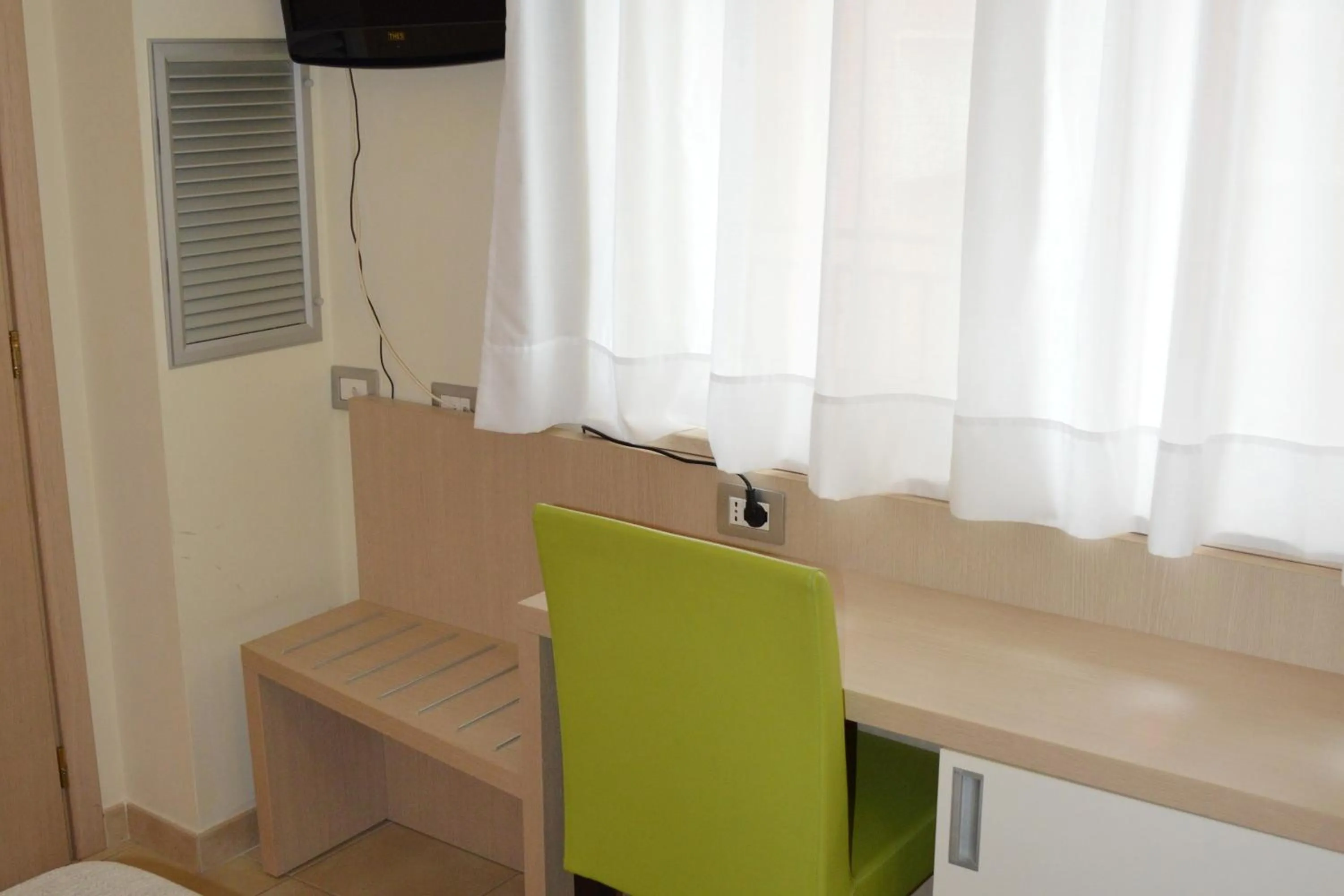 Bedroom in La Lanterna Hotel