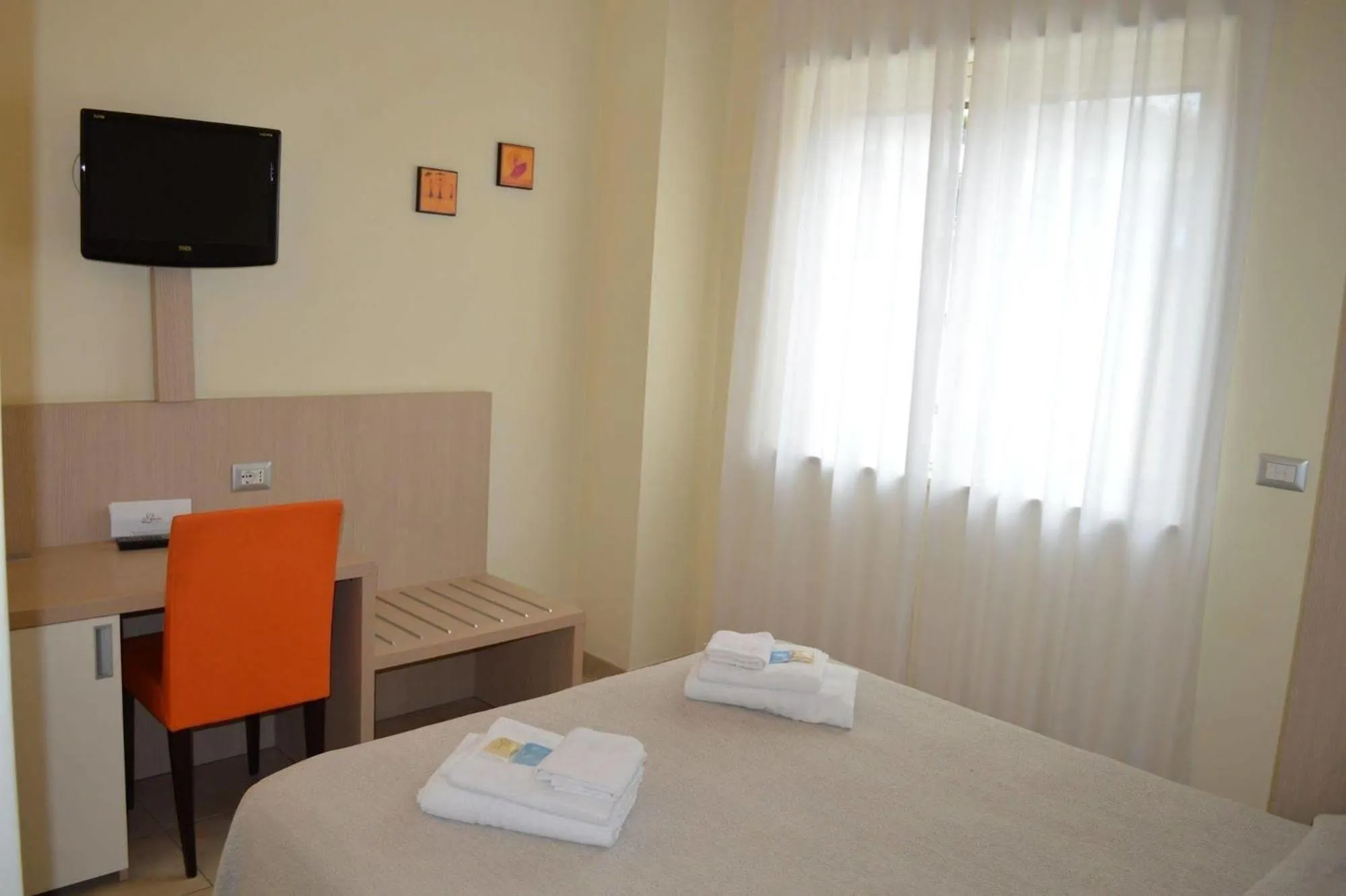 Bed in La Lanterna Hotel