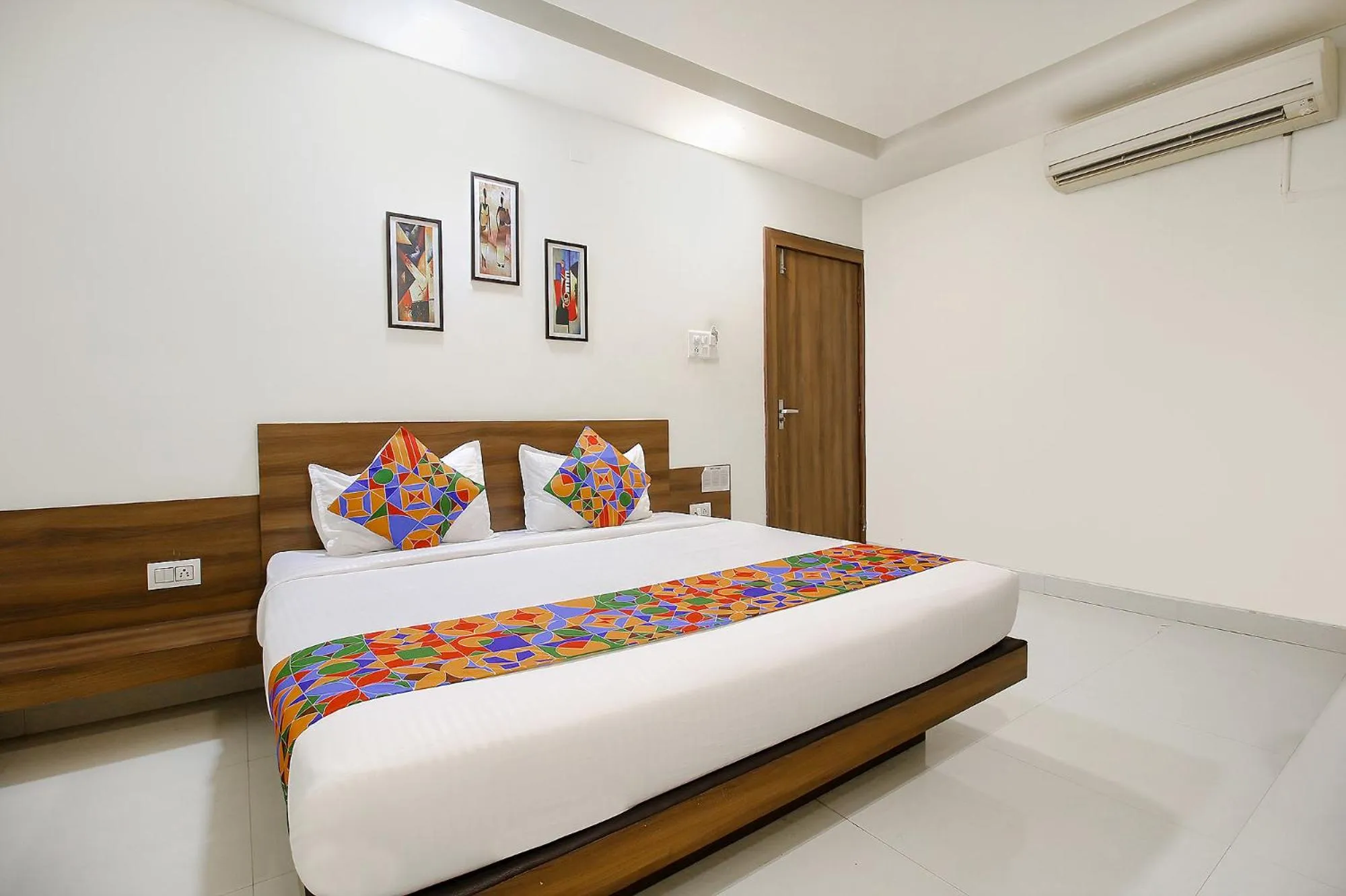 Photo of the whole room, Bed in FabExpress Comfort Stay I