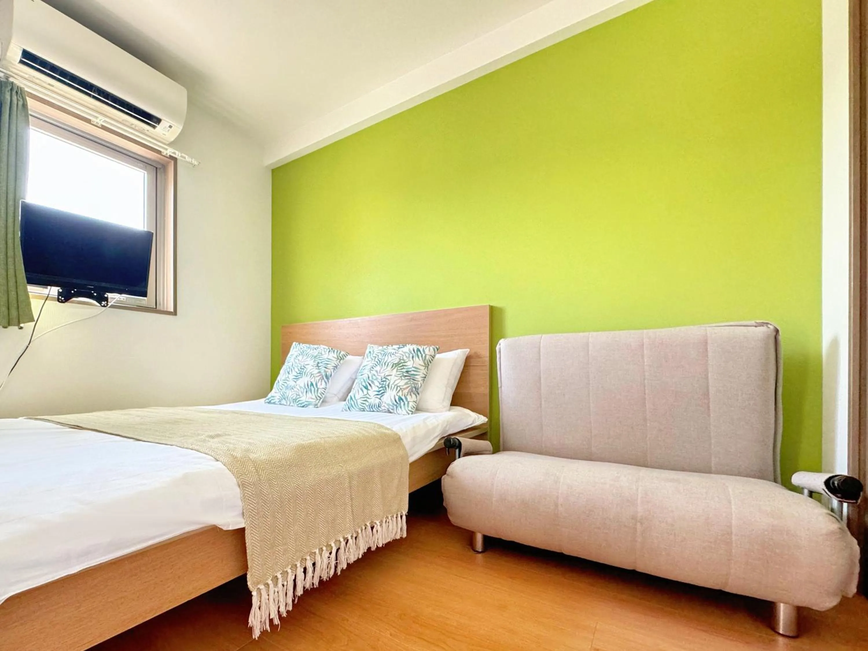 Bed in Juso AFP Apartment Hotel