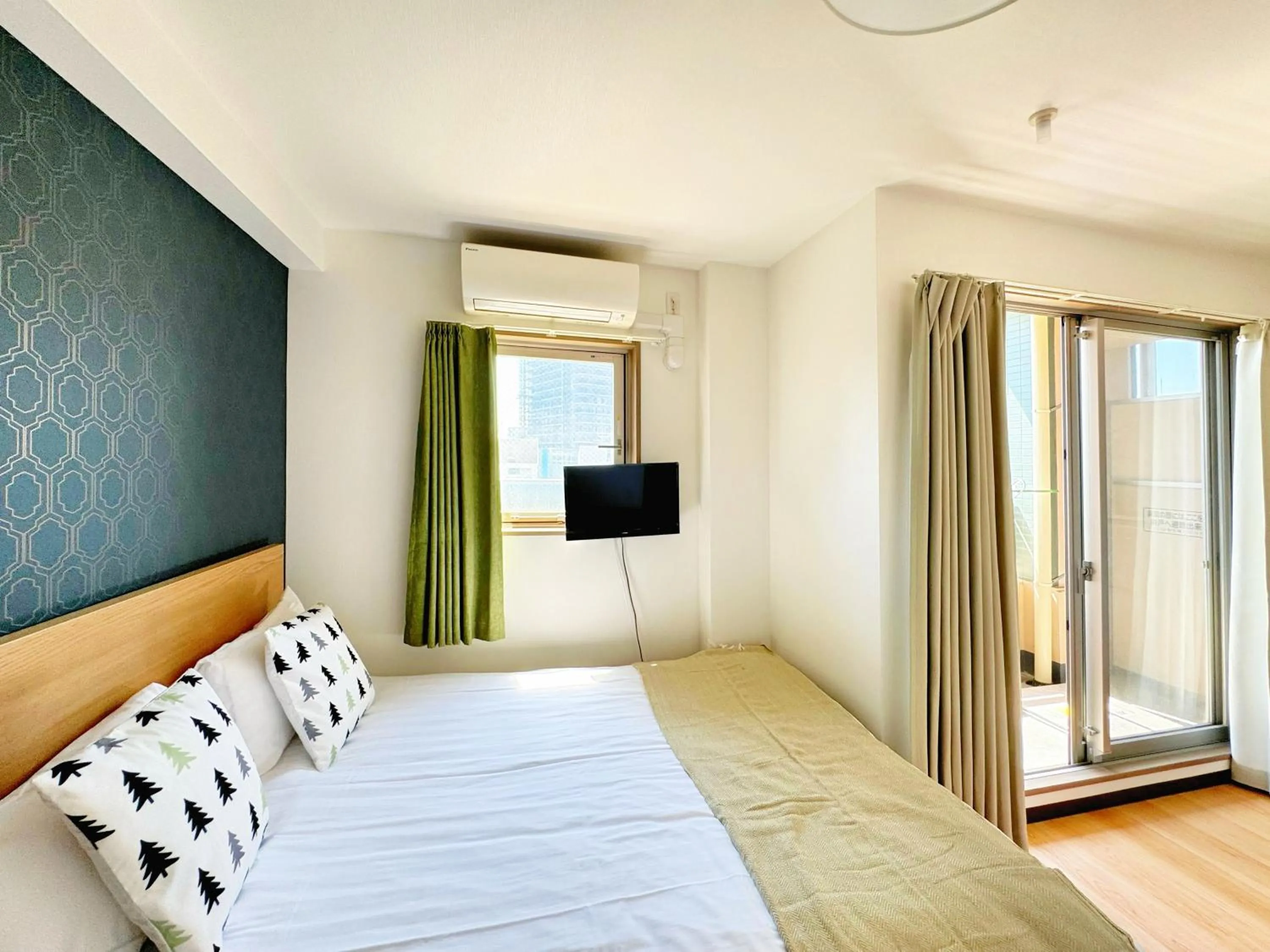 Bed in Juso AFP Apartment Hotel