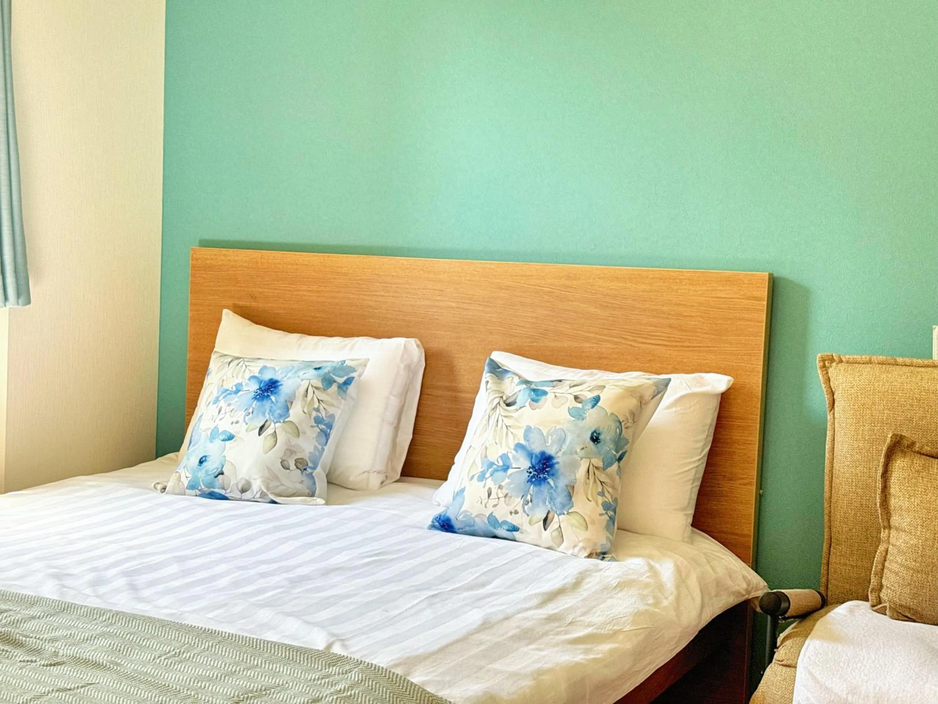 Bed in Juso AFP Apartment Hotel