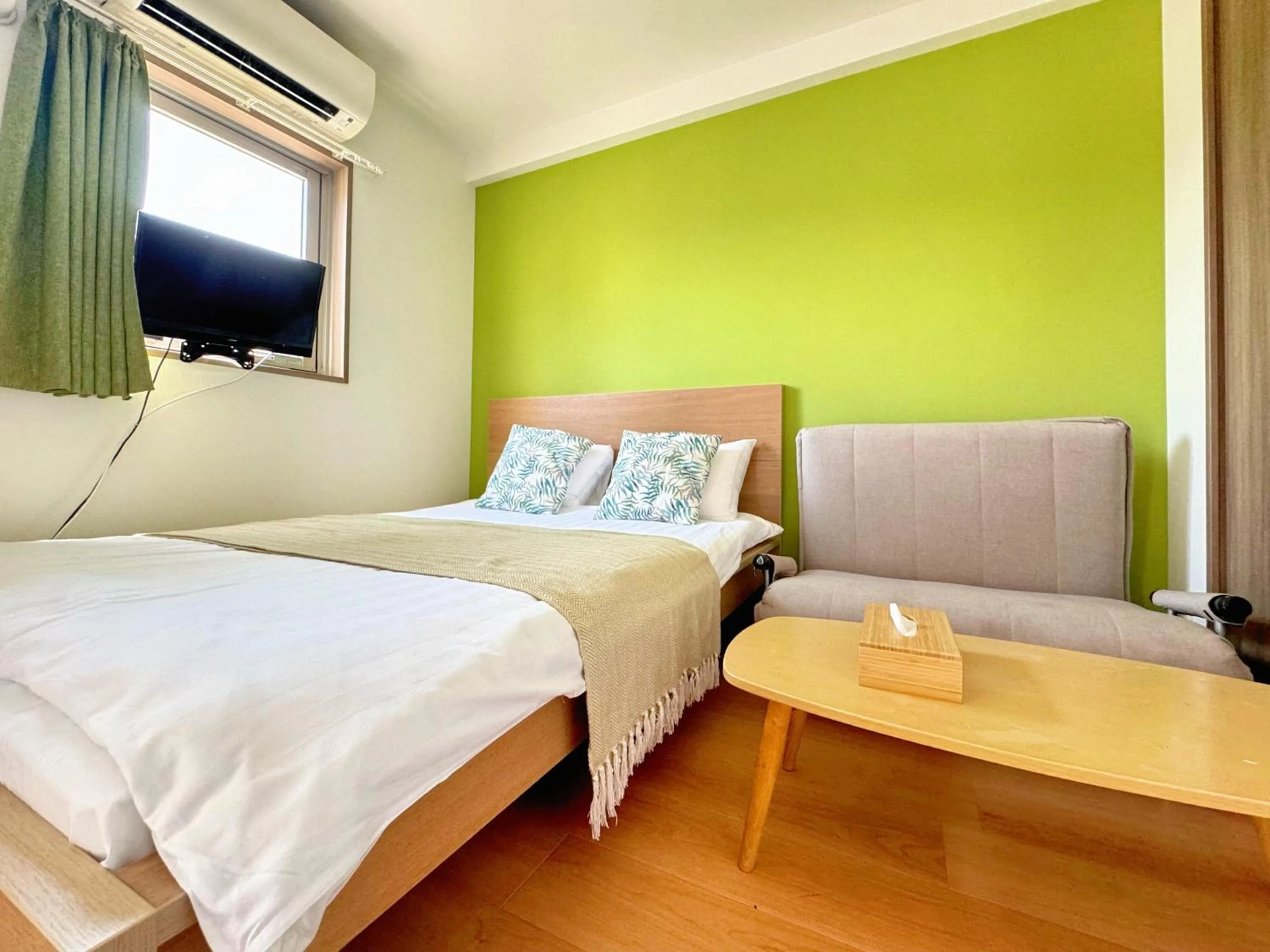 Bed in Juso AFP Apartment Hotel