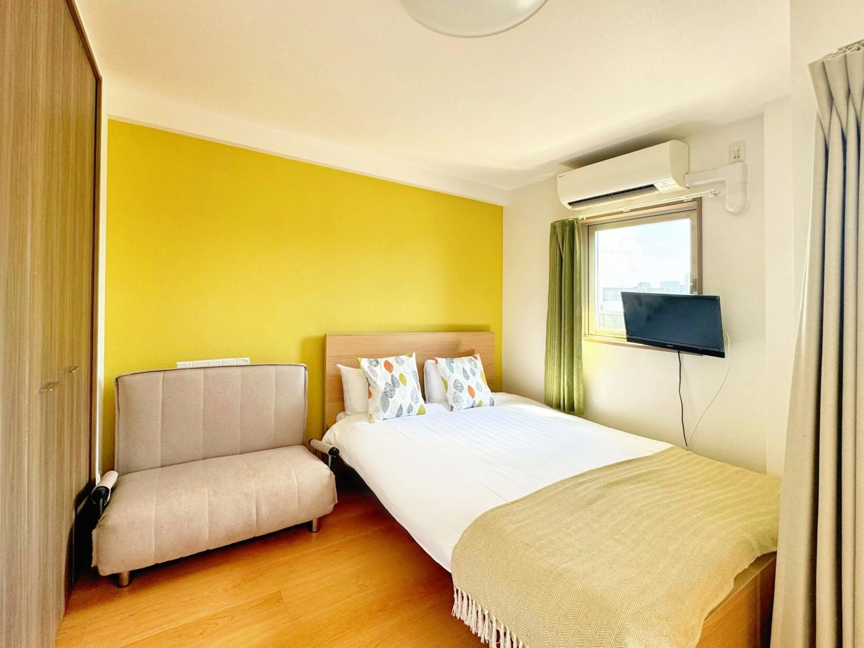 Bed in Juso AFP Apartment Hotel