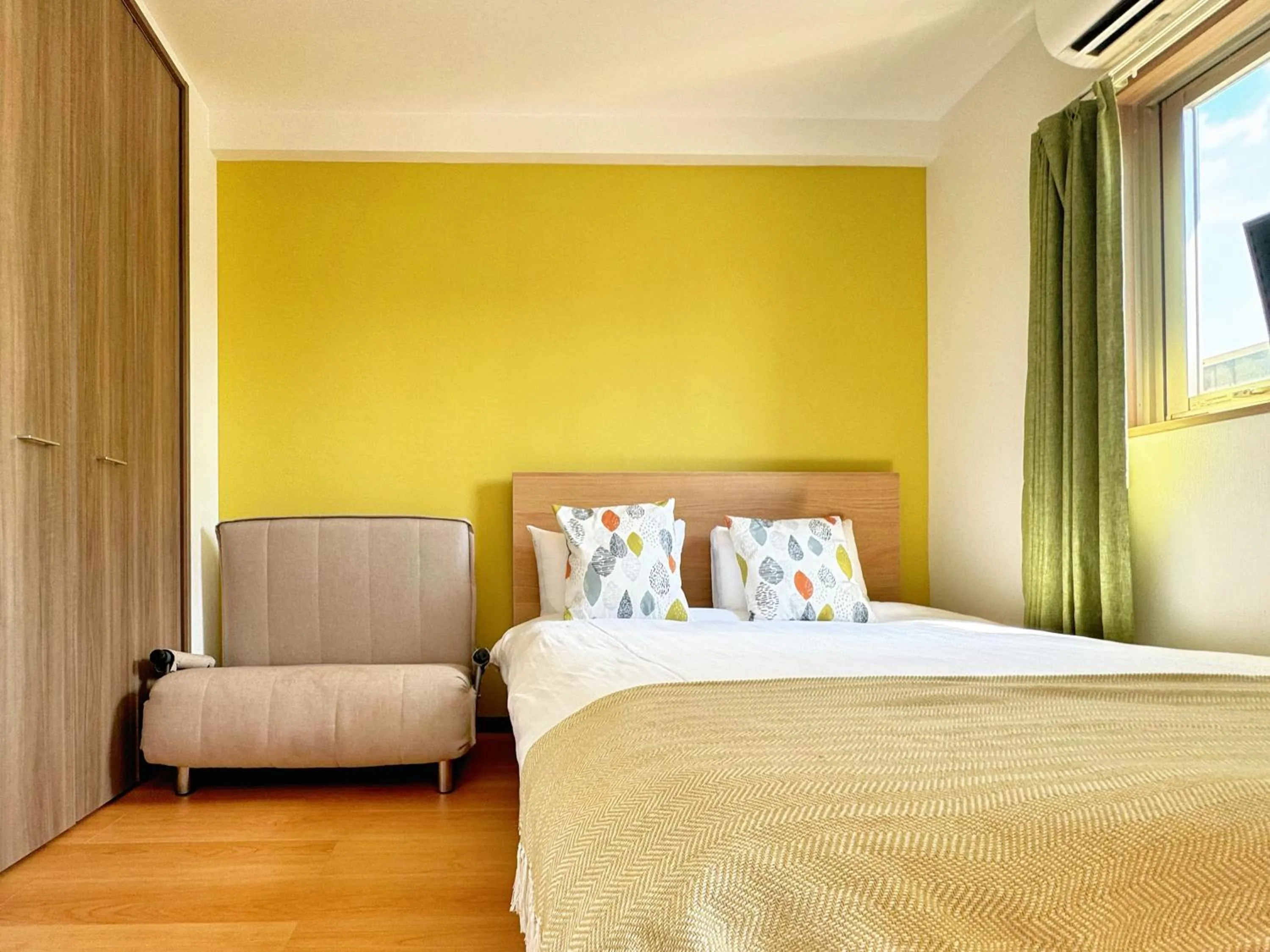 Bed in Juso AFP Apartment Hotel