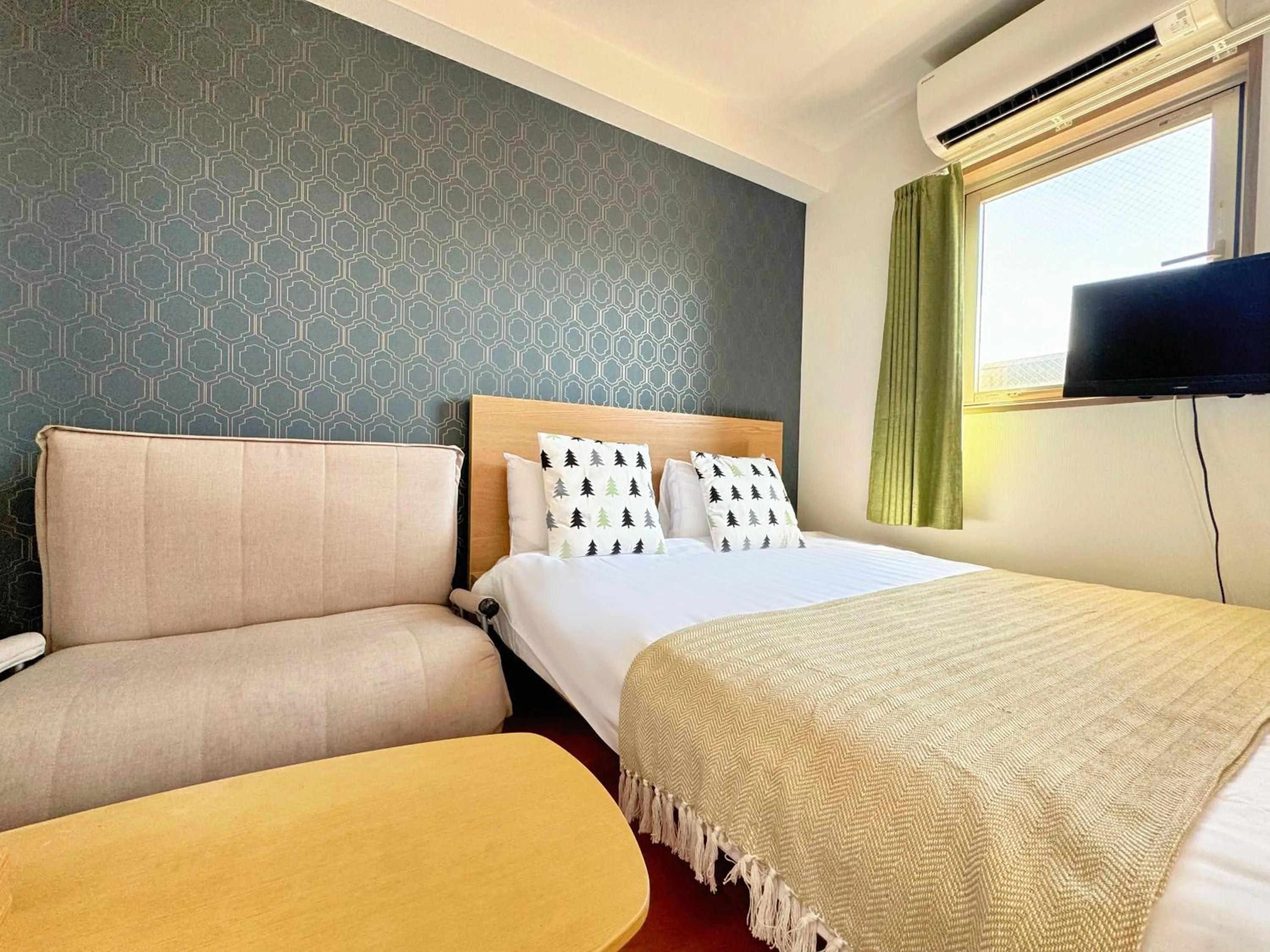 Bed in Juso AFP Apartment Hotel