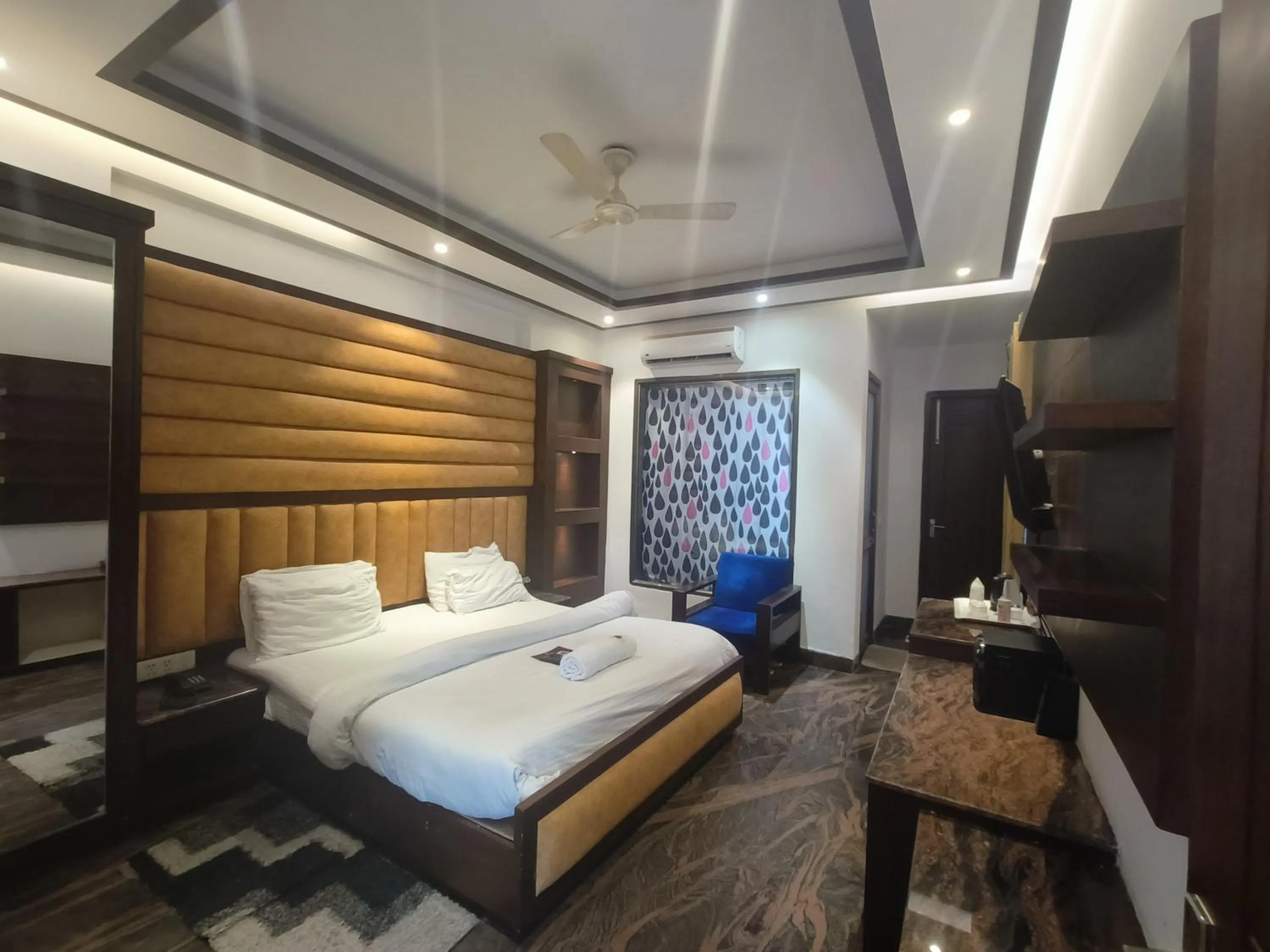 Bed in JJK Rukmini Vilas Hotel & Banquet