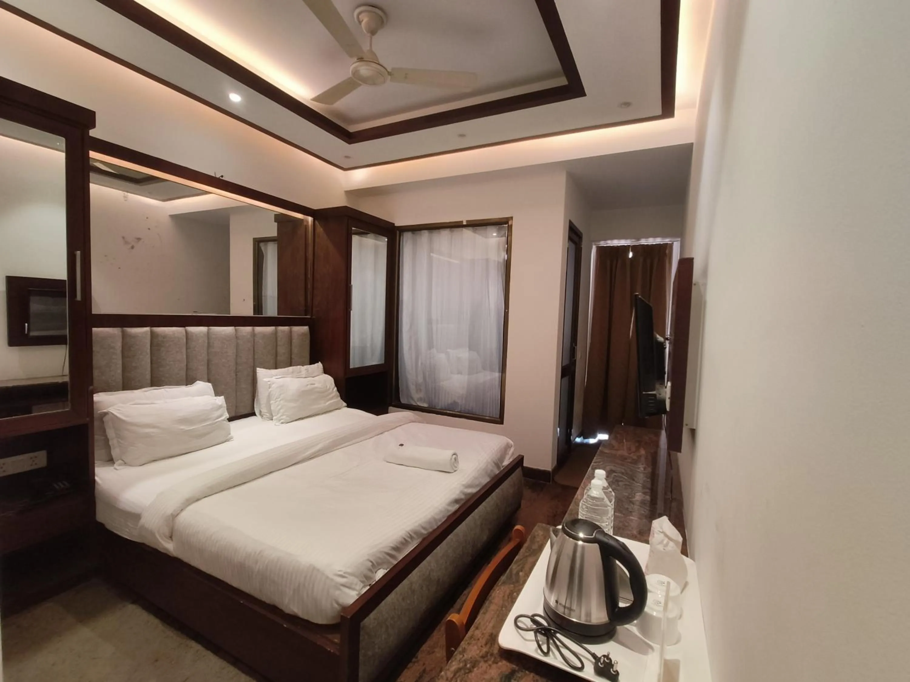 Bed in JJK Rukmini Vilas Hotel & Banquet