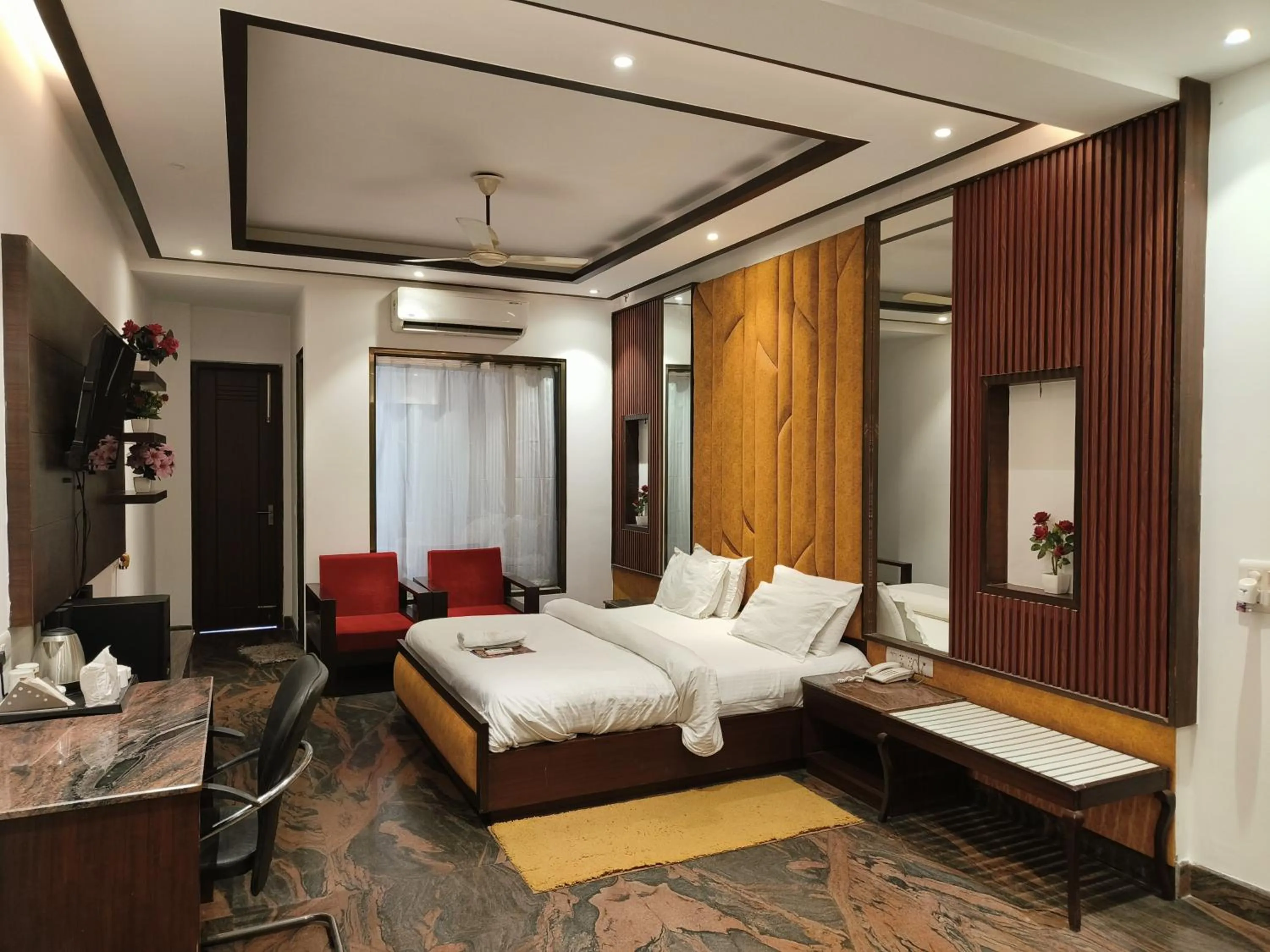 Bed in JJK Rukmini Vilas Hotel & Banquet