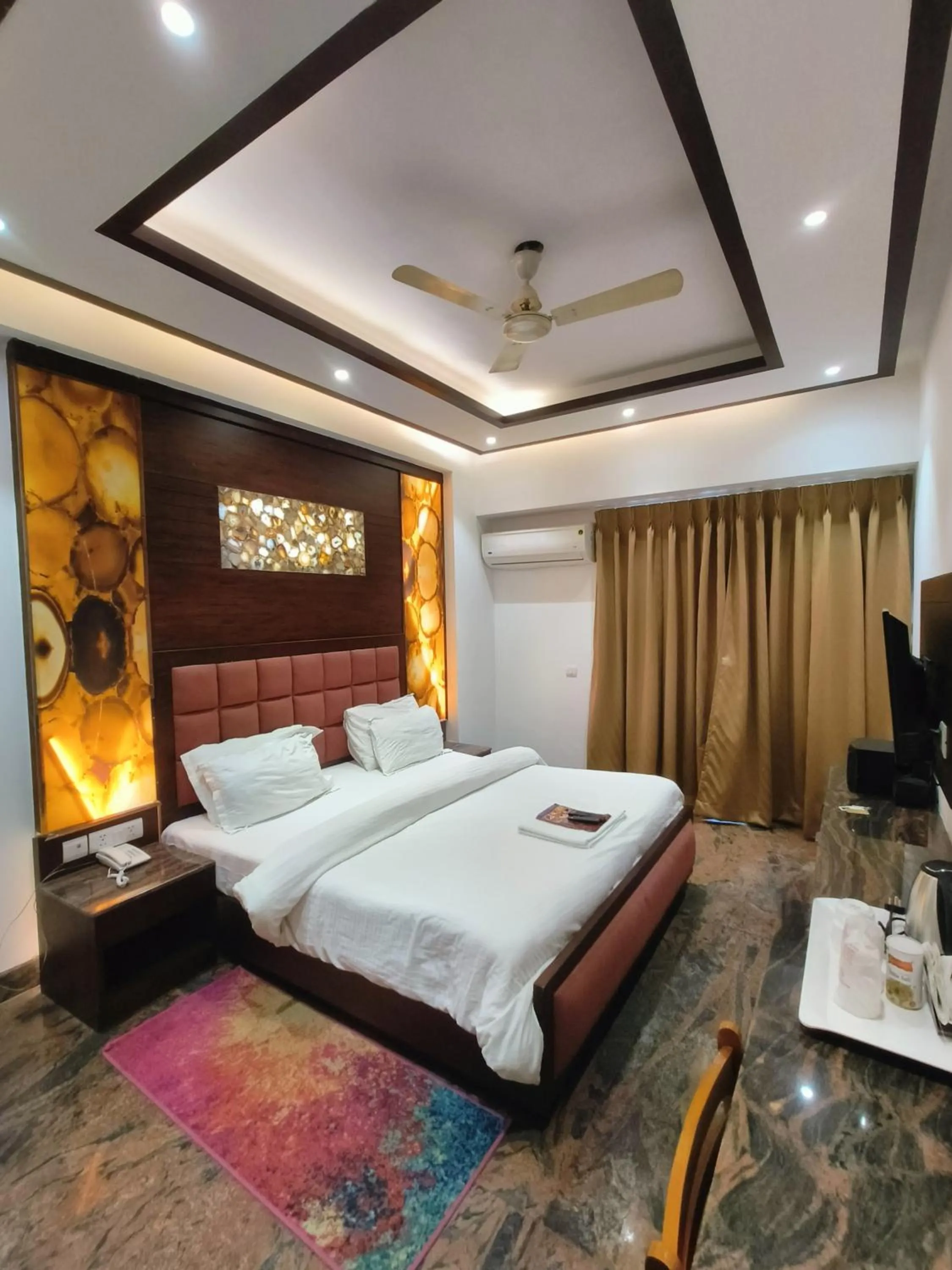Bed in JJK Rukmini Vilas Hotel & Banquet