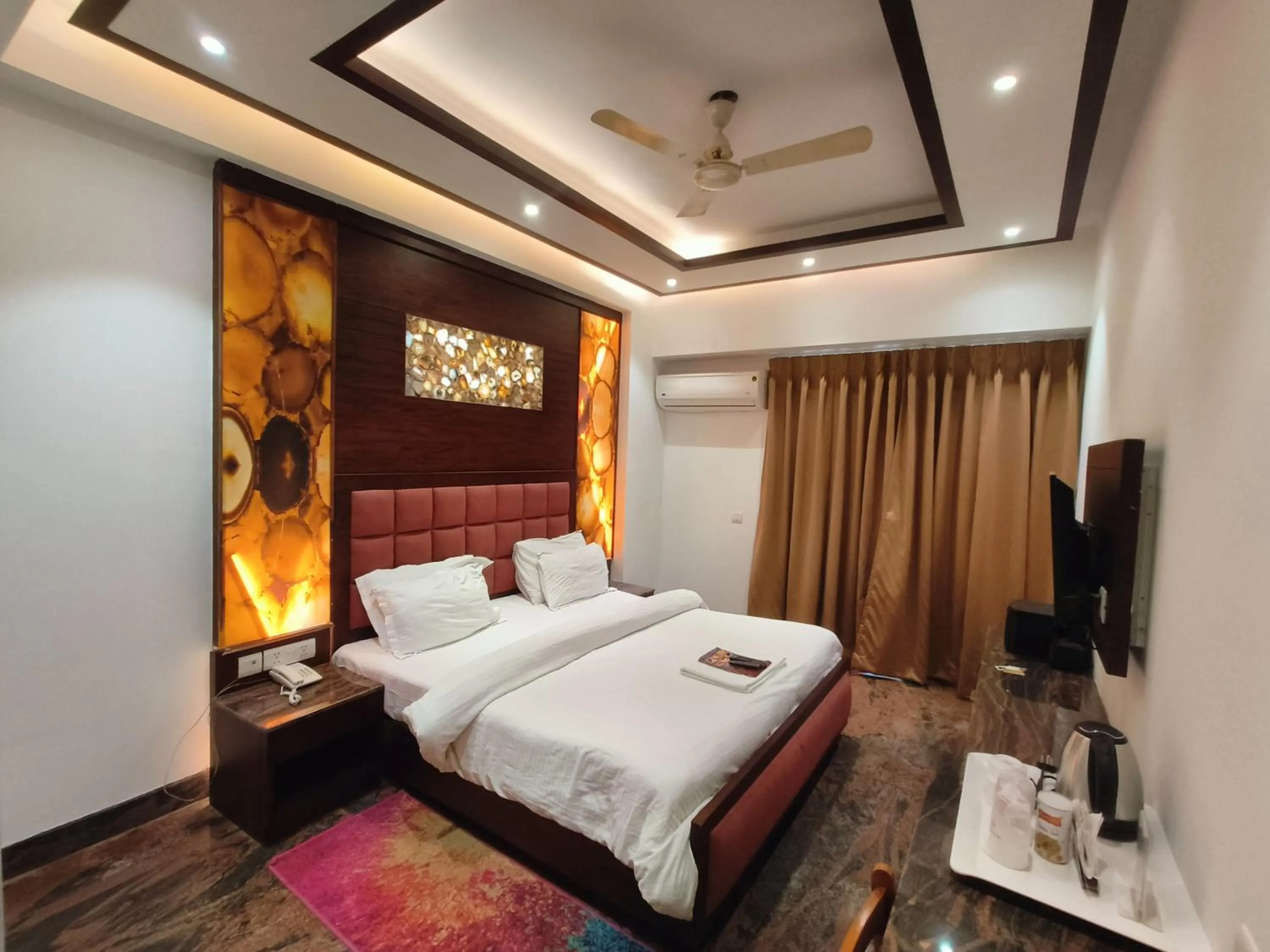 Bed in JJK Rukmini Vilas Hotel & Banquet