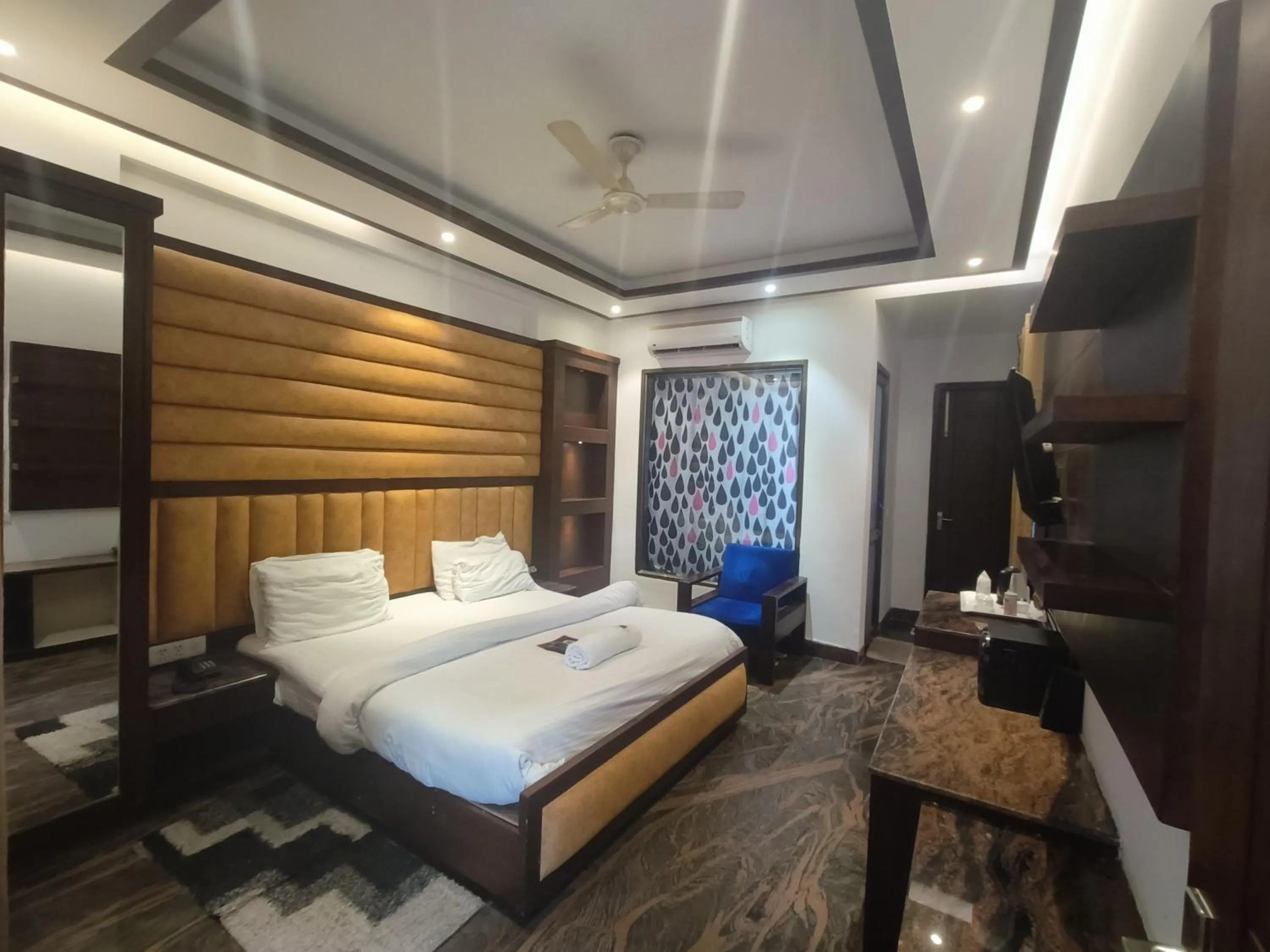 Bed in JJK Rukmini Vilas Hotel & Banquet
