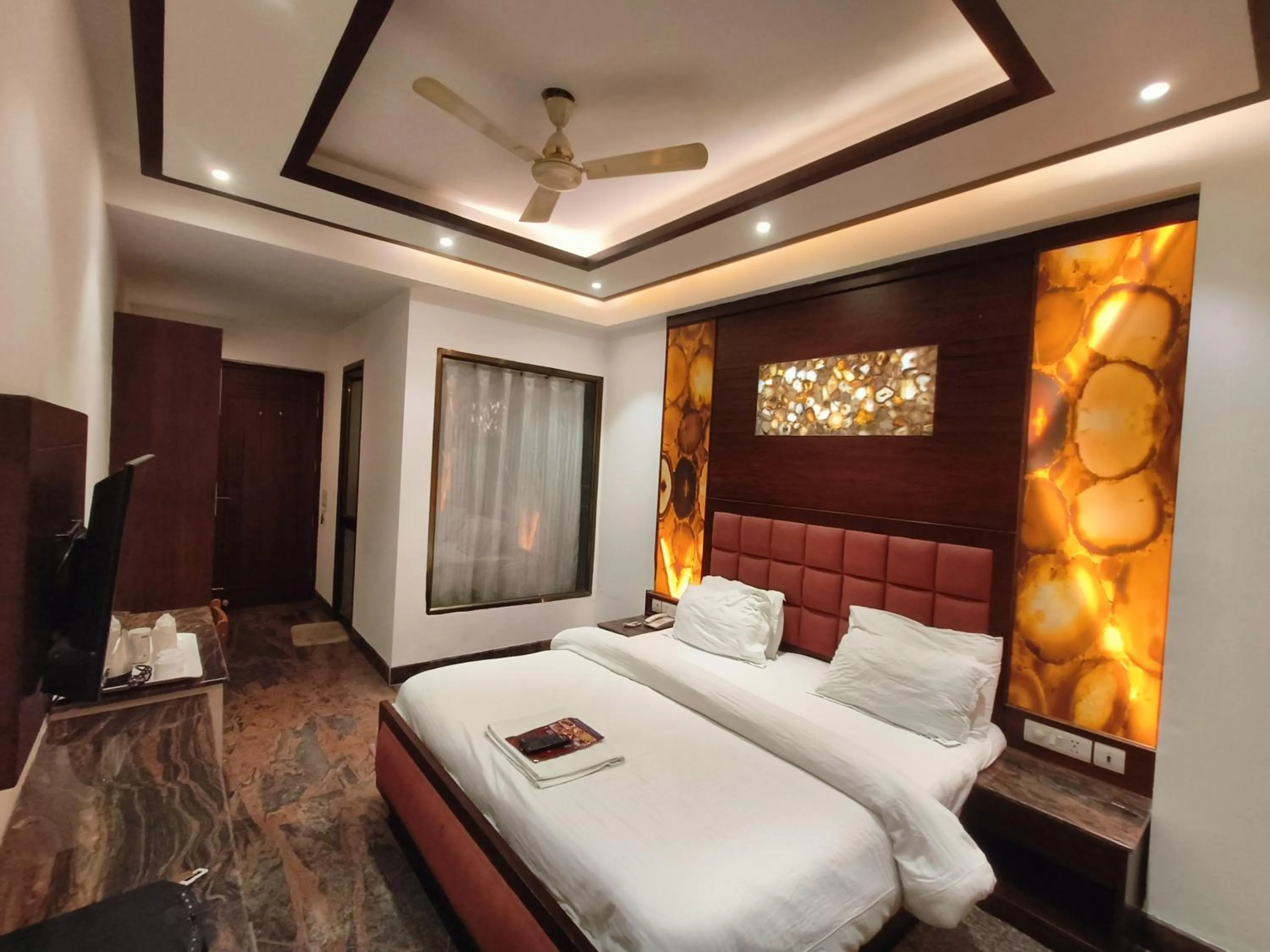 Bed in JJK Rukmini Vilas Hotel & Banquet