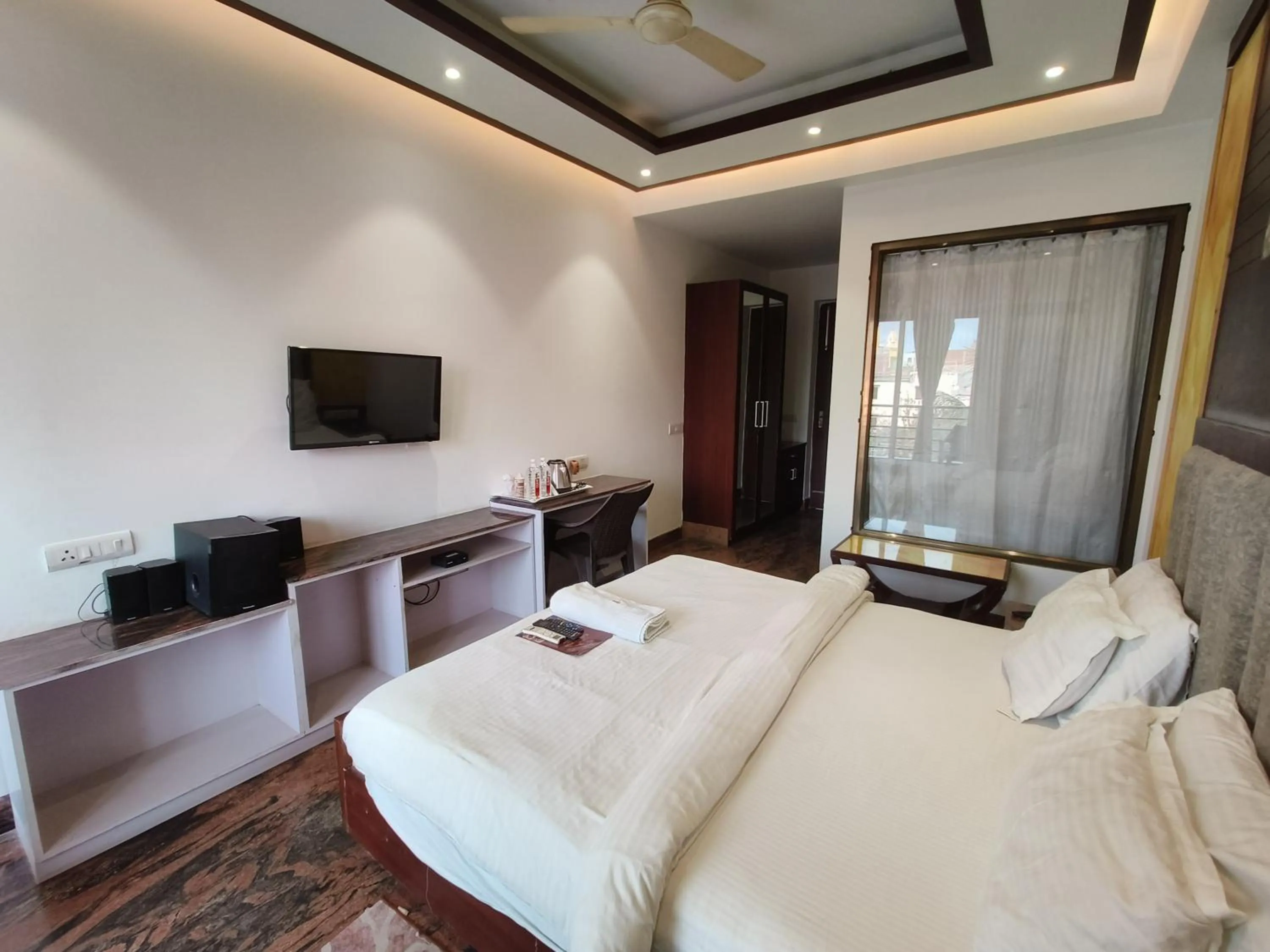 Bed in JJK Rukmini Vilas Hotel & Banquet