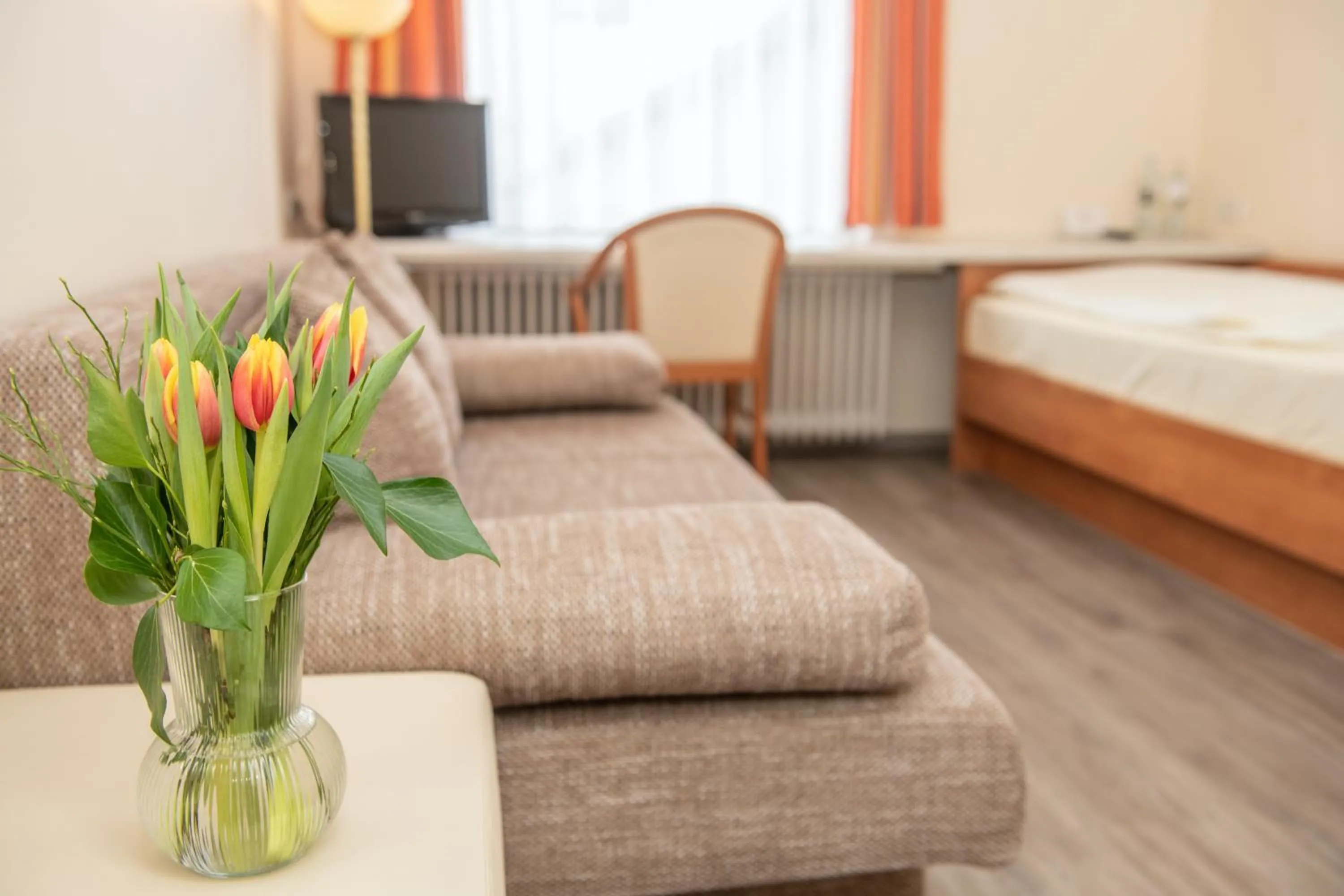 Seating area, Bed in Hotel Daub