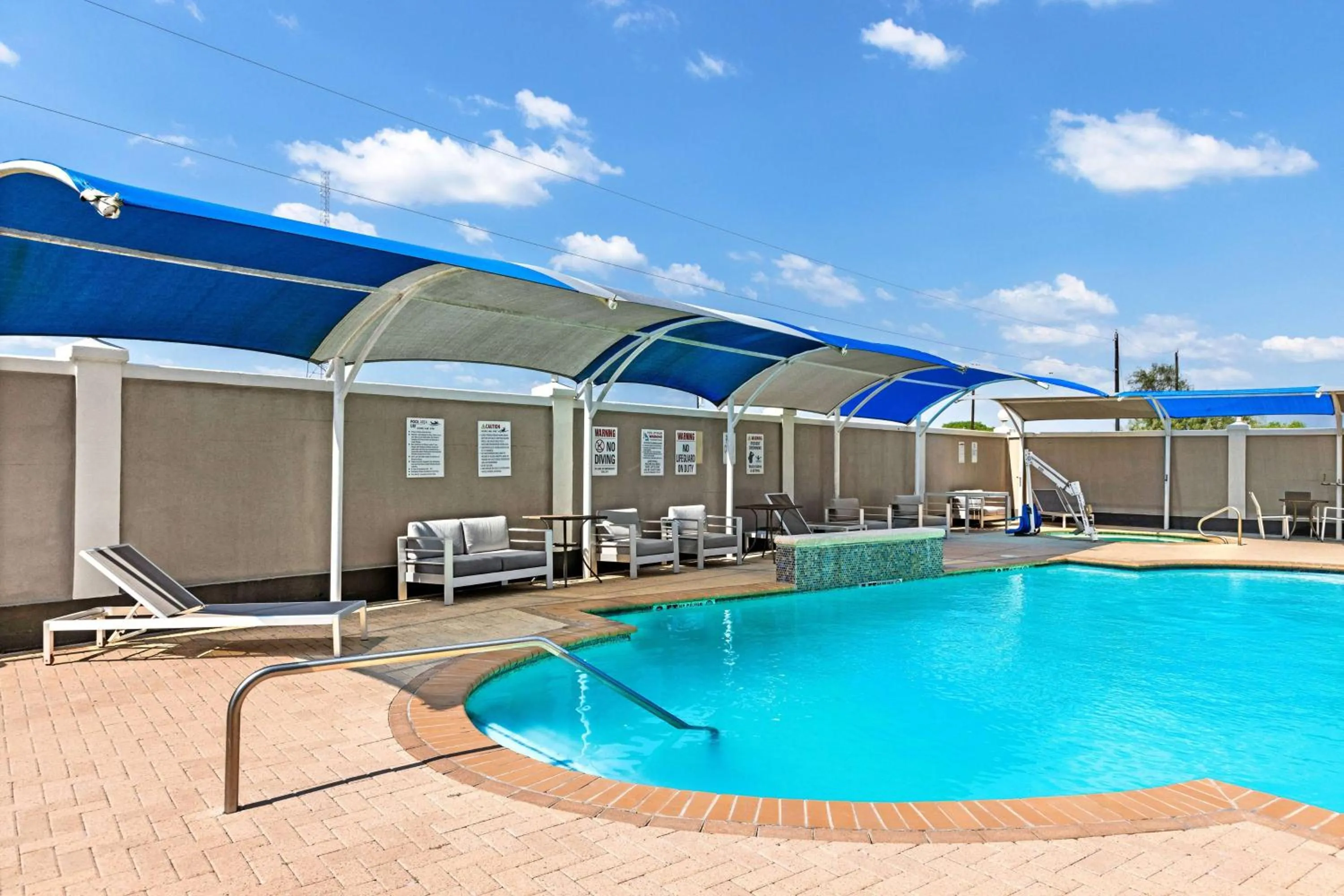 Pool view in La Quinta Inn Suites by Wyndham Raymondville Harlingen