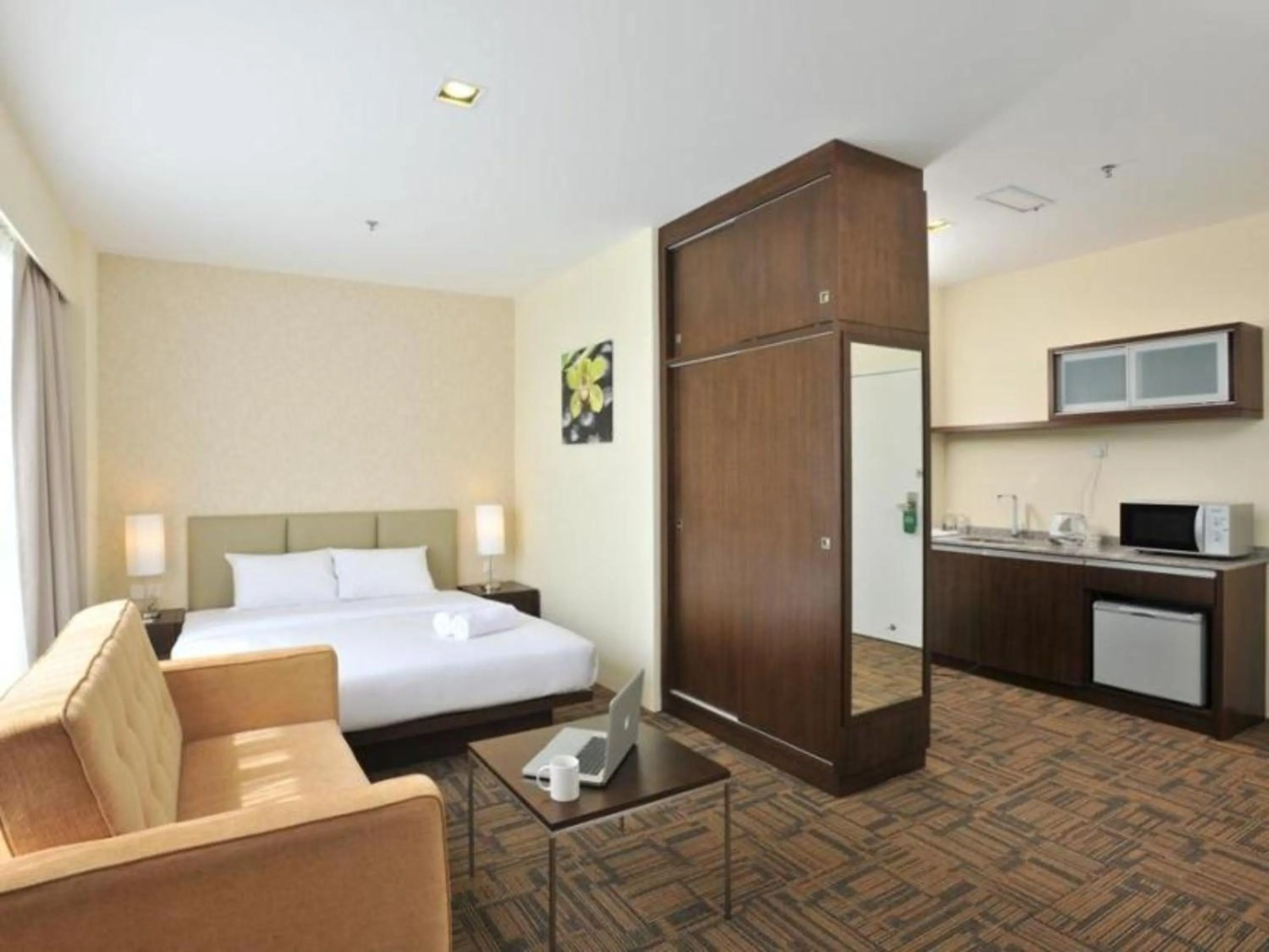 Kitchen or kitchenette, Bed in Hotel Primera Suite Cyberjaya