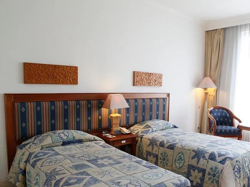 Bed in Resor Tuban Tropis