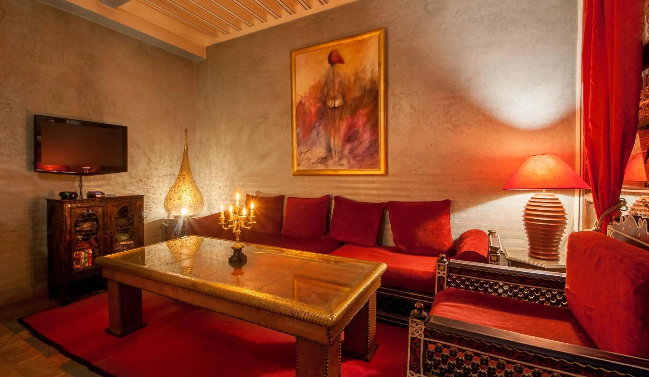 Communal lounge/ TV room in Riad Eden