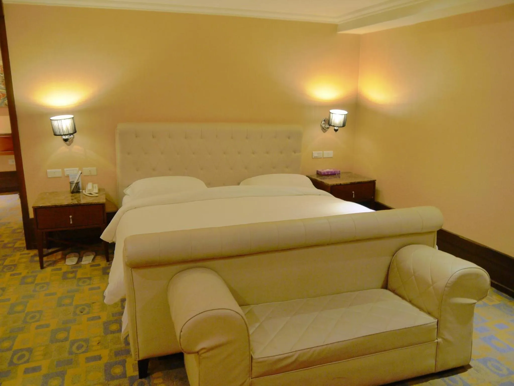 Bed in Kai Wei Boutique Hotel