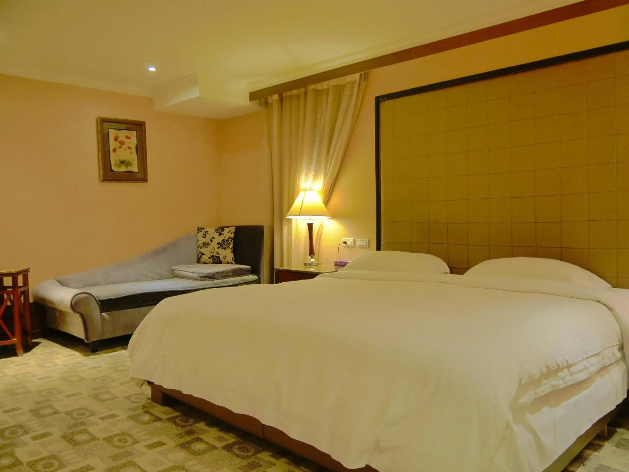 Bed in Kai Wei Boutique Hotel