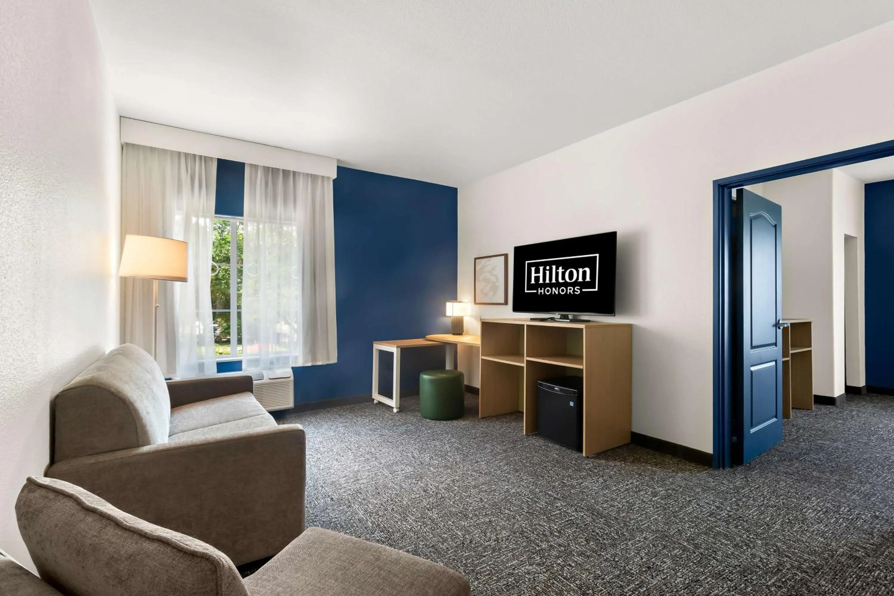 Living room in Spark By Hilton Missouri City