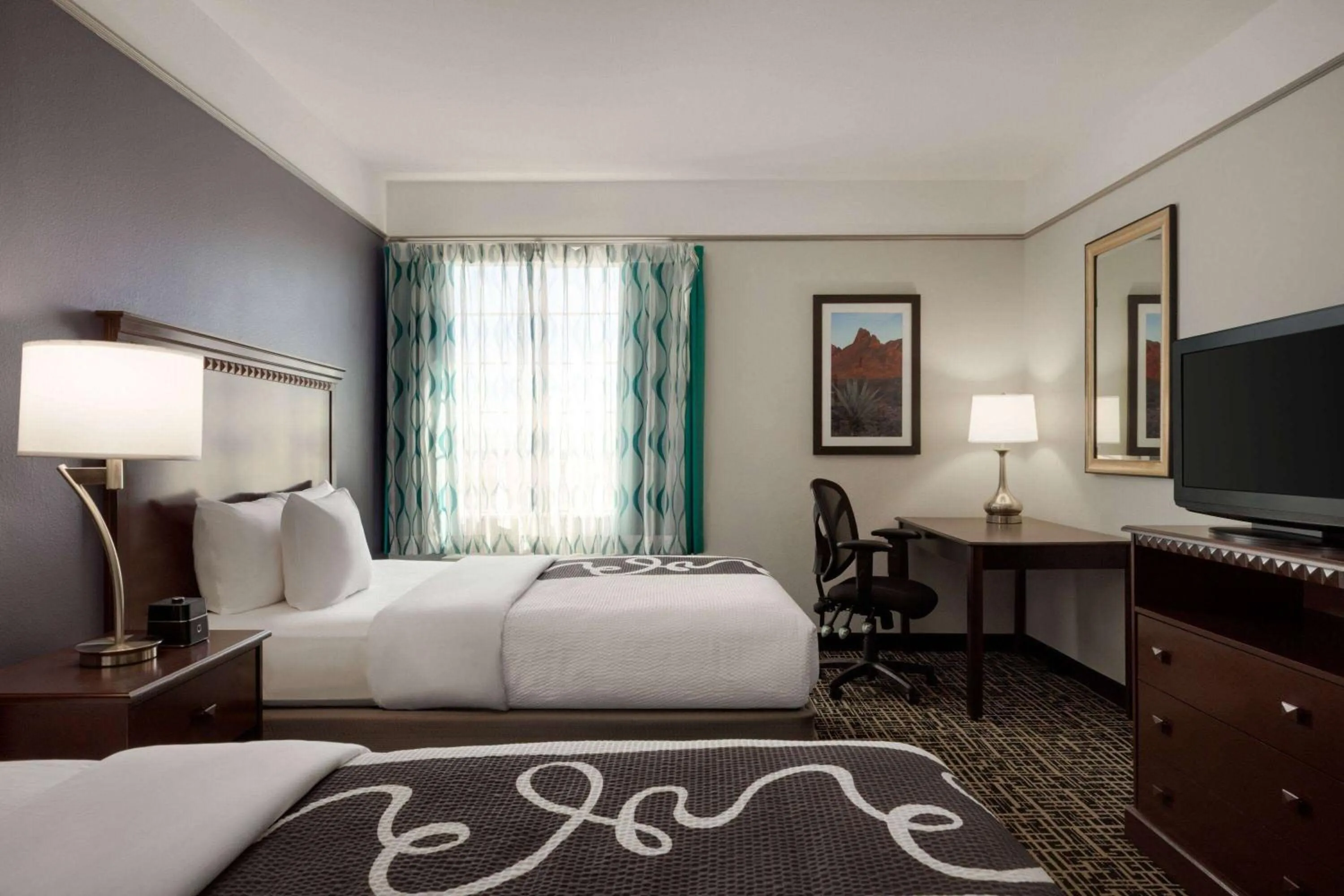 Photo of the whole room, Bed in La Quinta by Wyndham Dumas