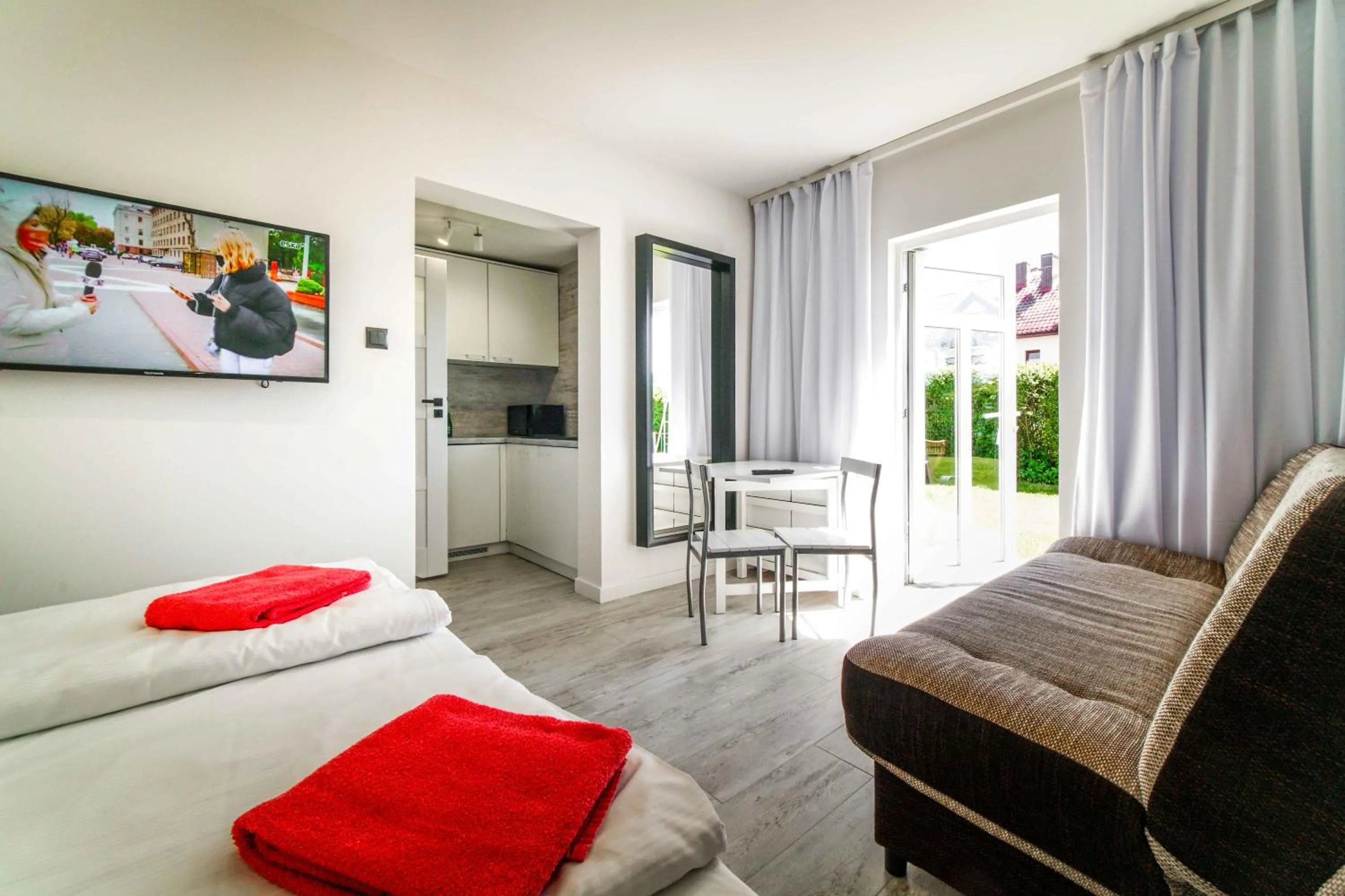 Kitchen or kitchenette, Bed in Wczasowa 8 Apartments