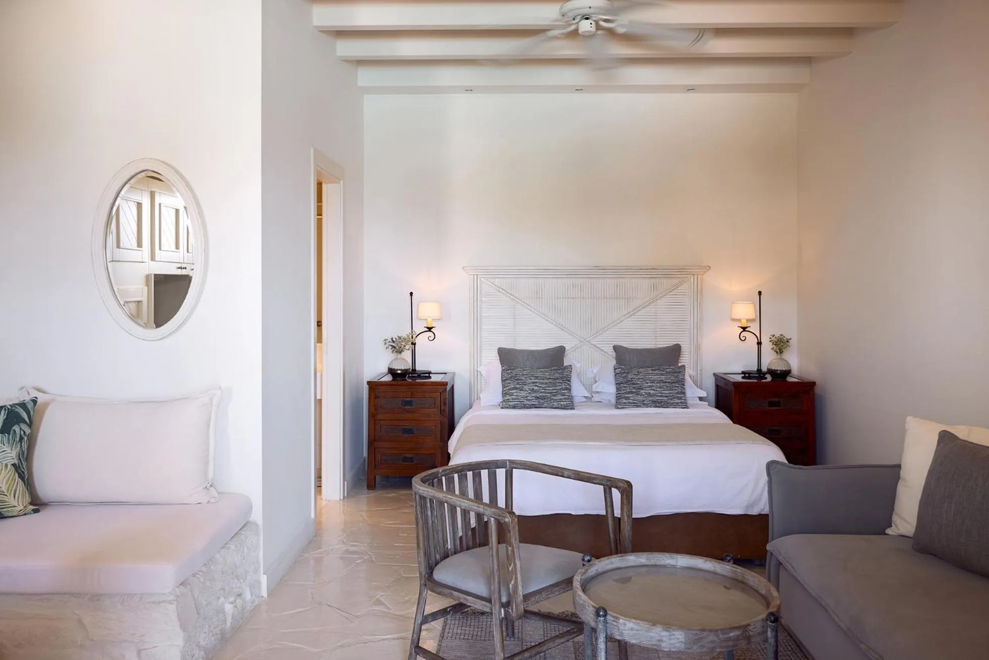 Living room, Bed in Porto Kea Suites by Sandglass