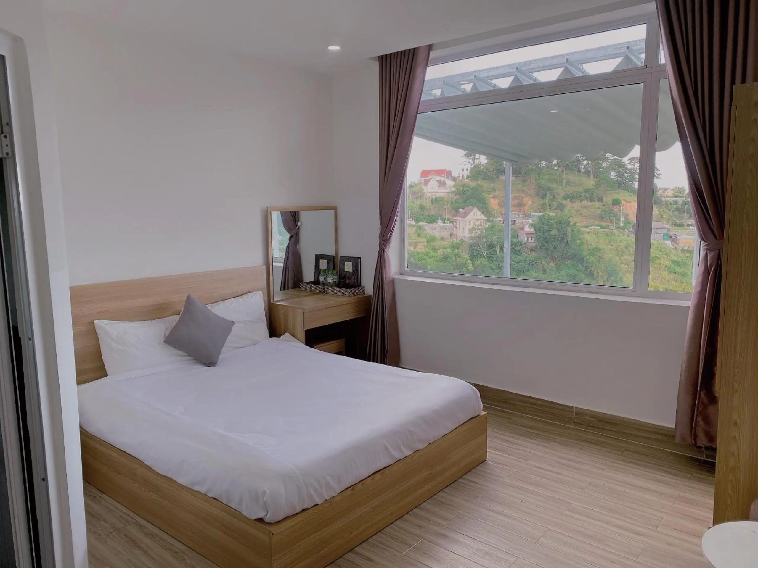 Photo of the whole room, Bed in Lacami Dalat Hotel