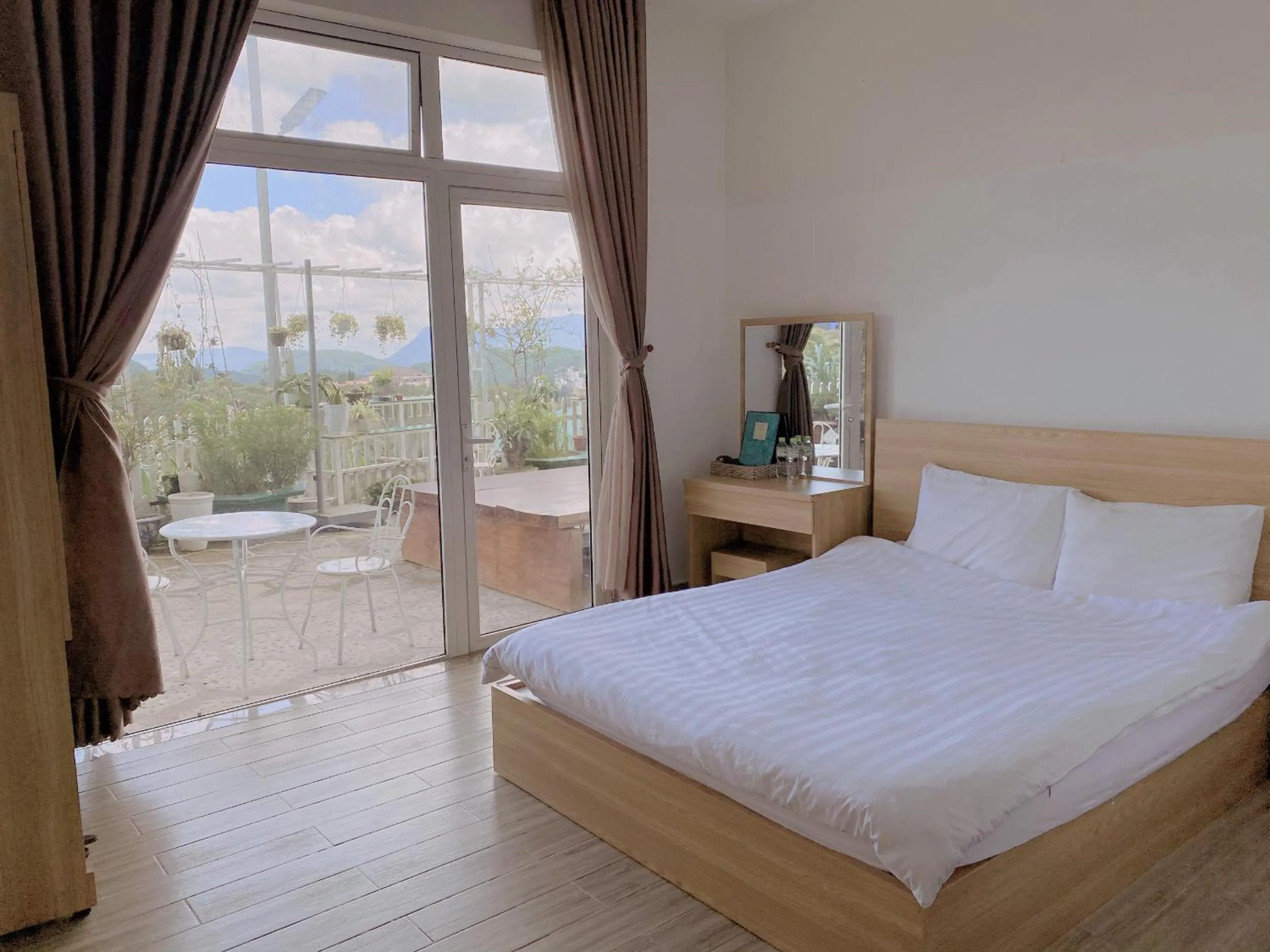 Photo of the whole room, Bed in Lacami Dalat Hotel