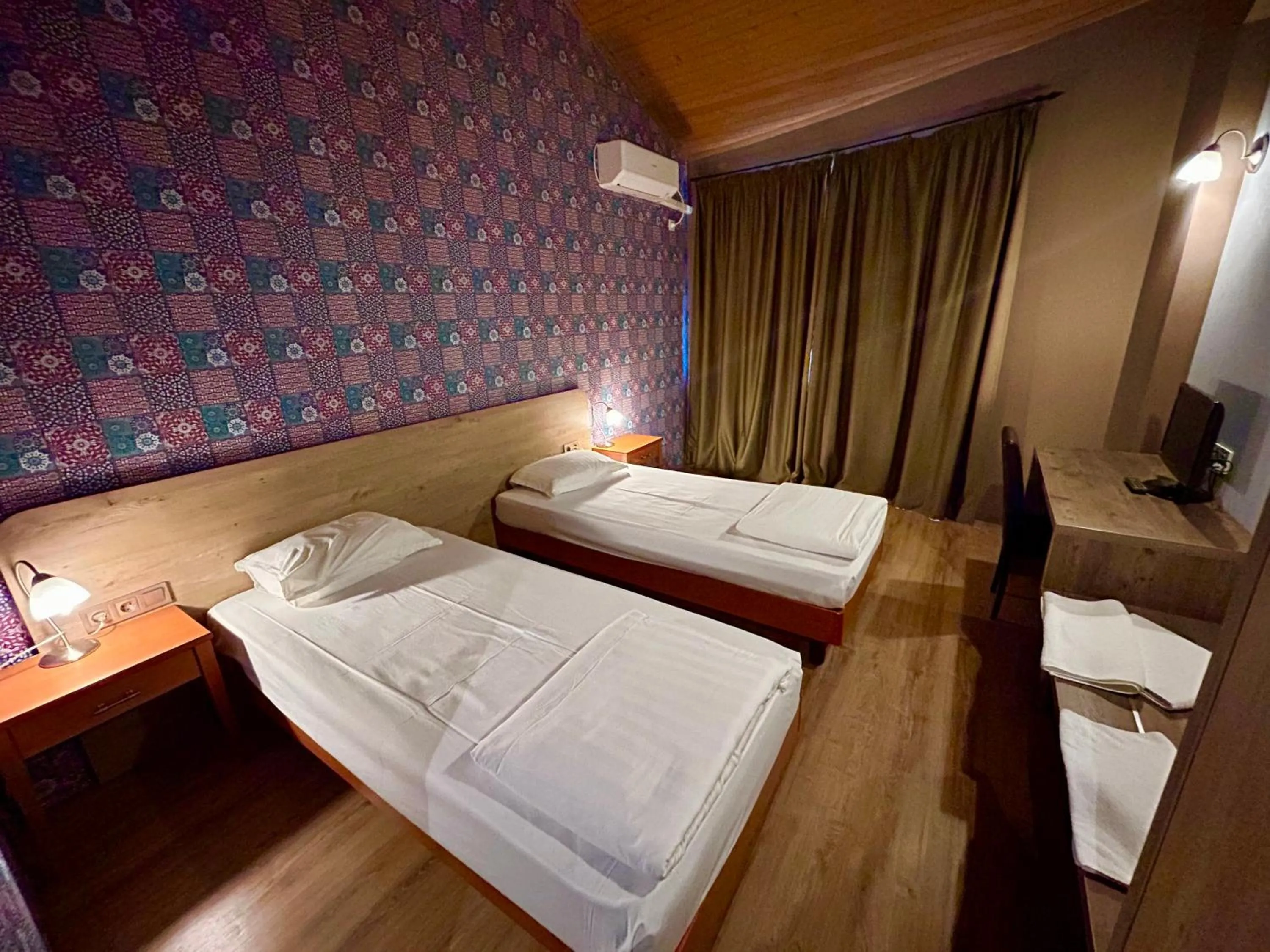 Bed in Dragoman Hotel