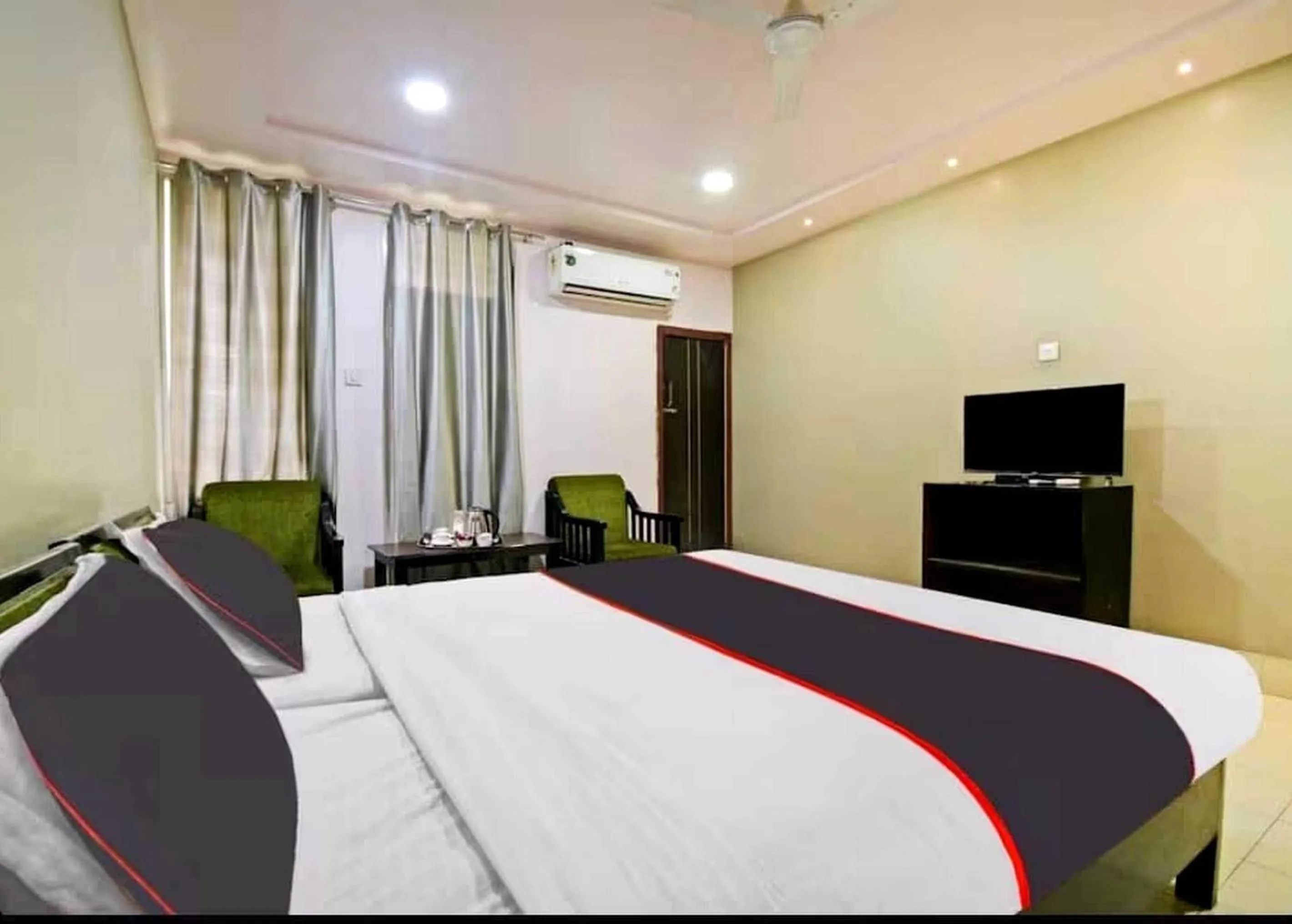 Bedroom in Collection O Megha Resort