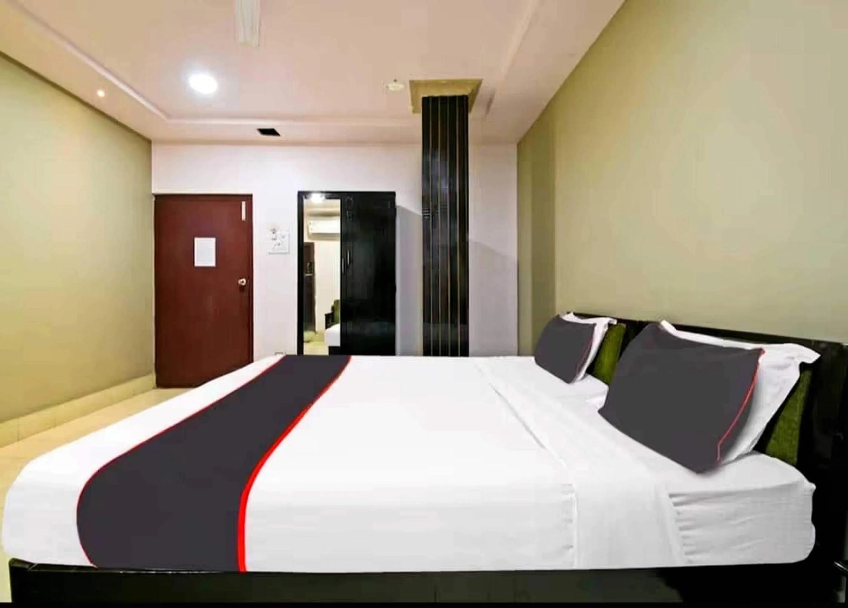 Bedroom in Collection O Megha Resort