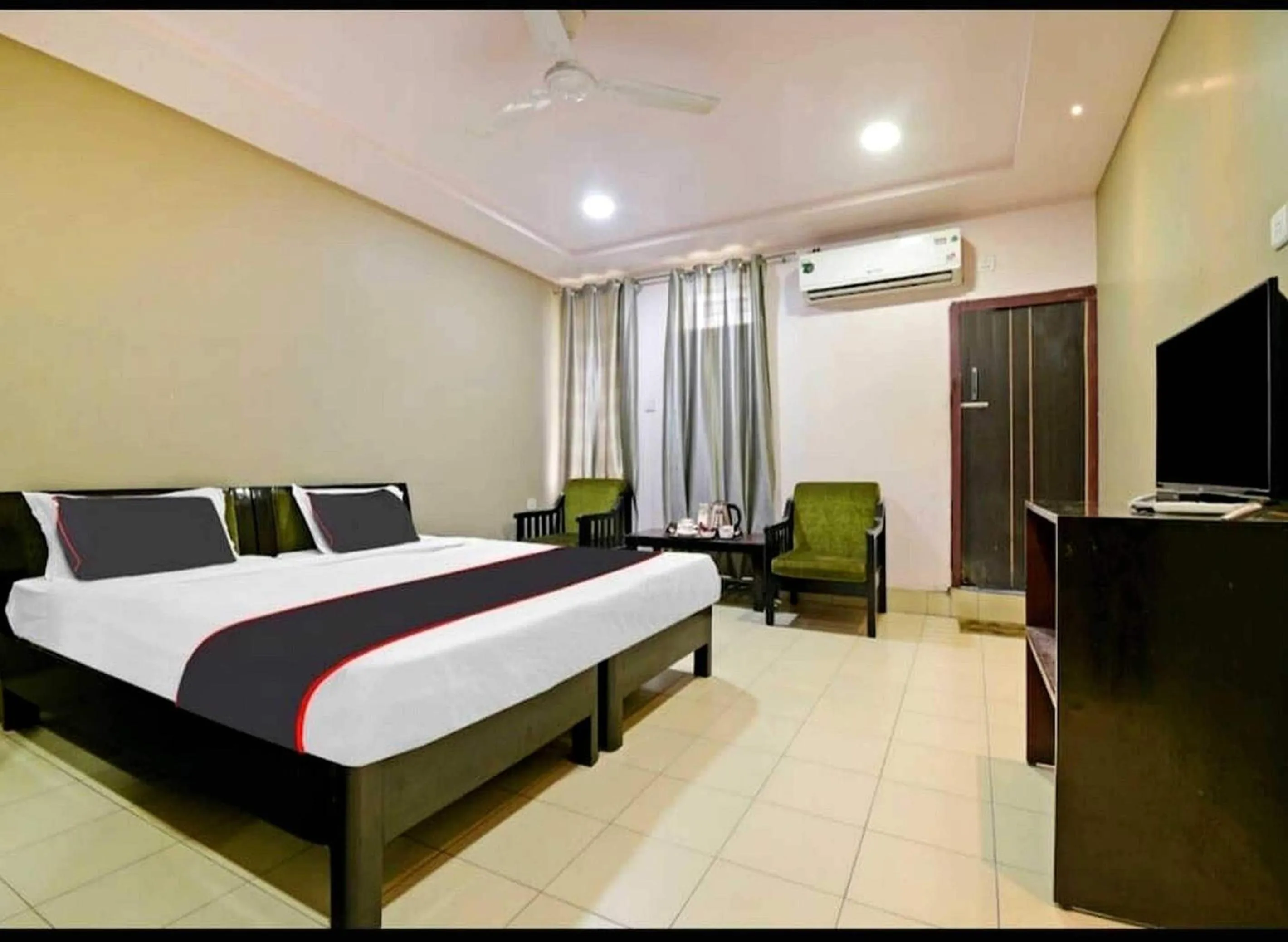 Bedroom in Collection O Megha Resort