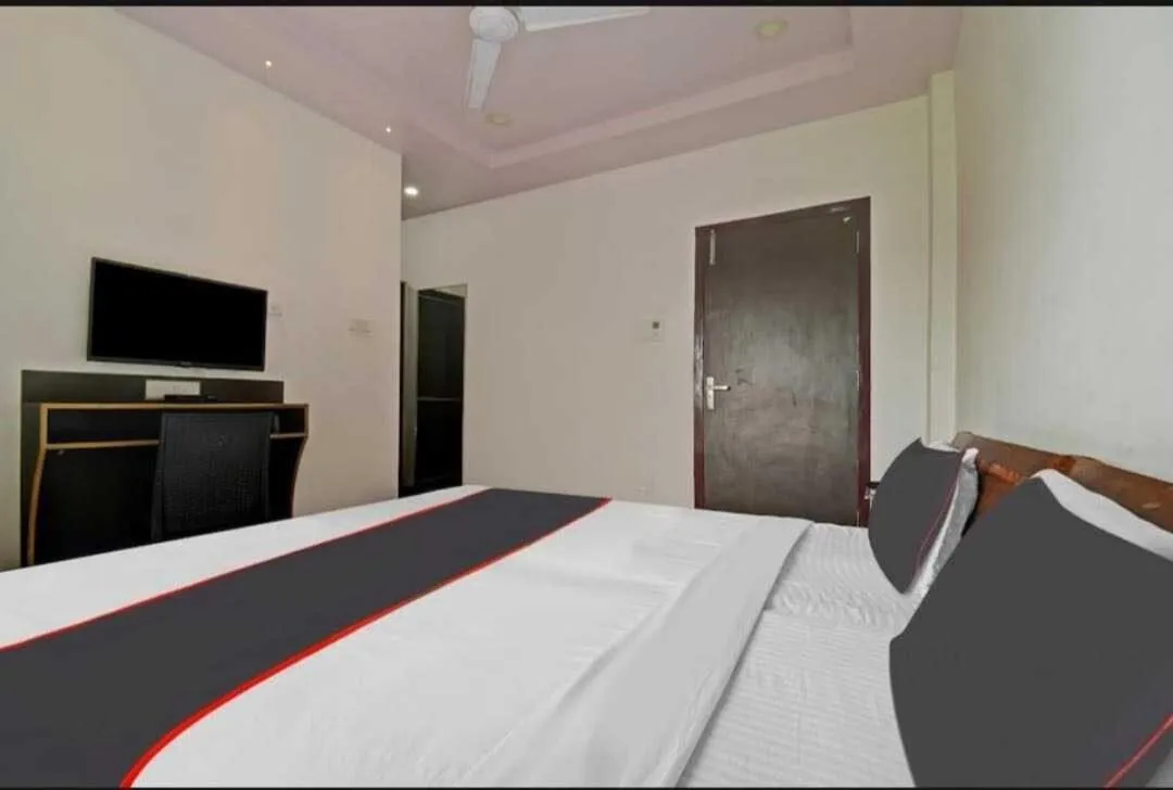 Bedroom in Collection O Megha Resort