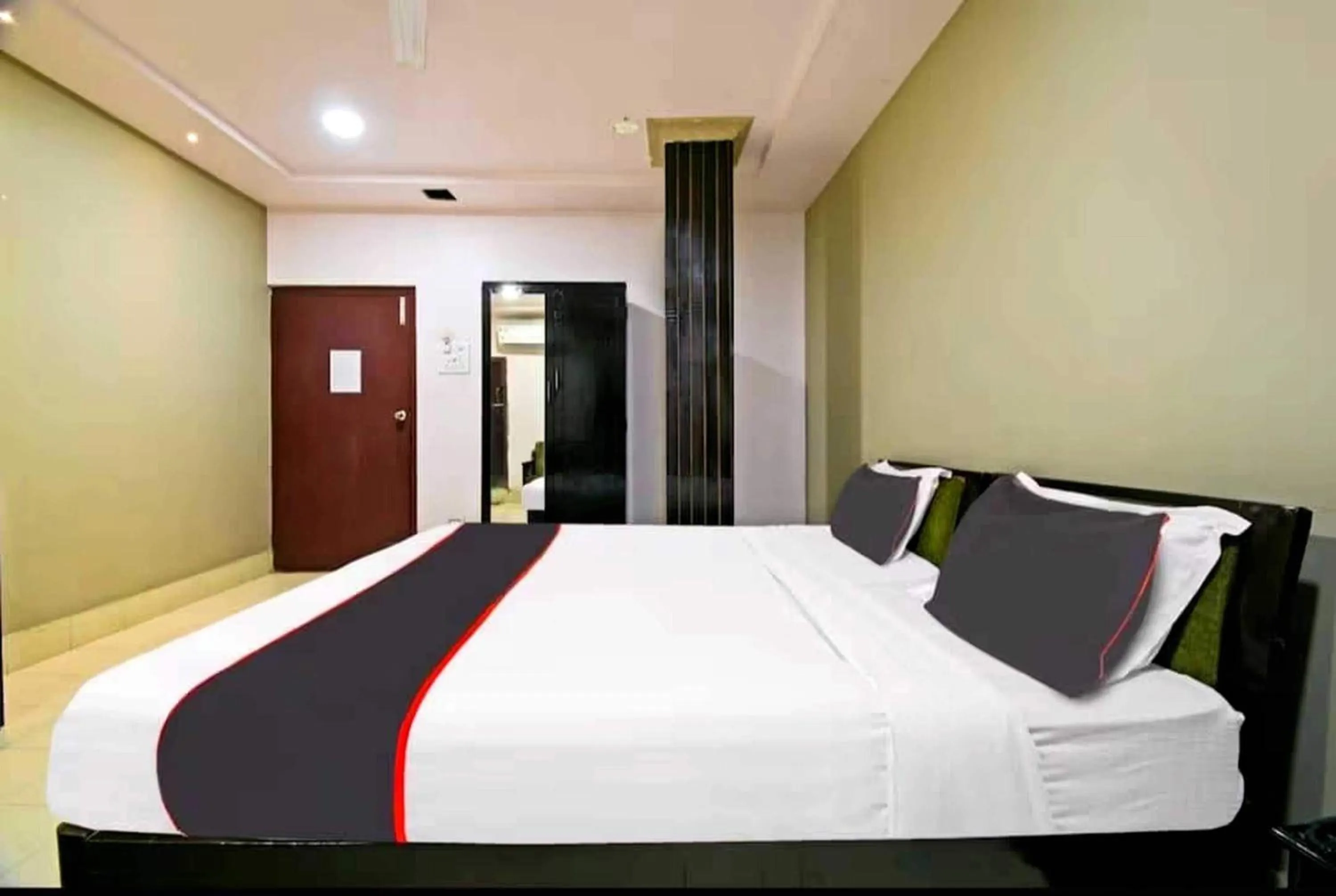 Bedroom in Collection O Megha Resort