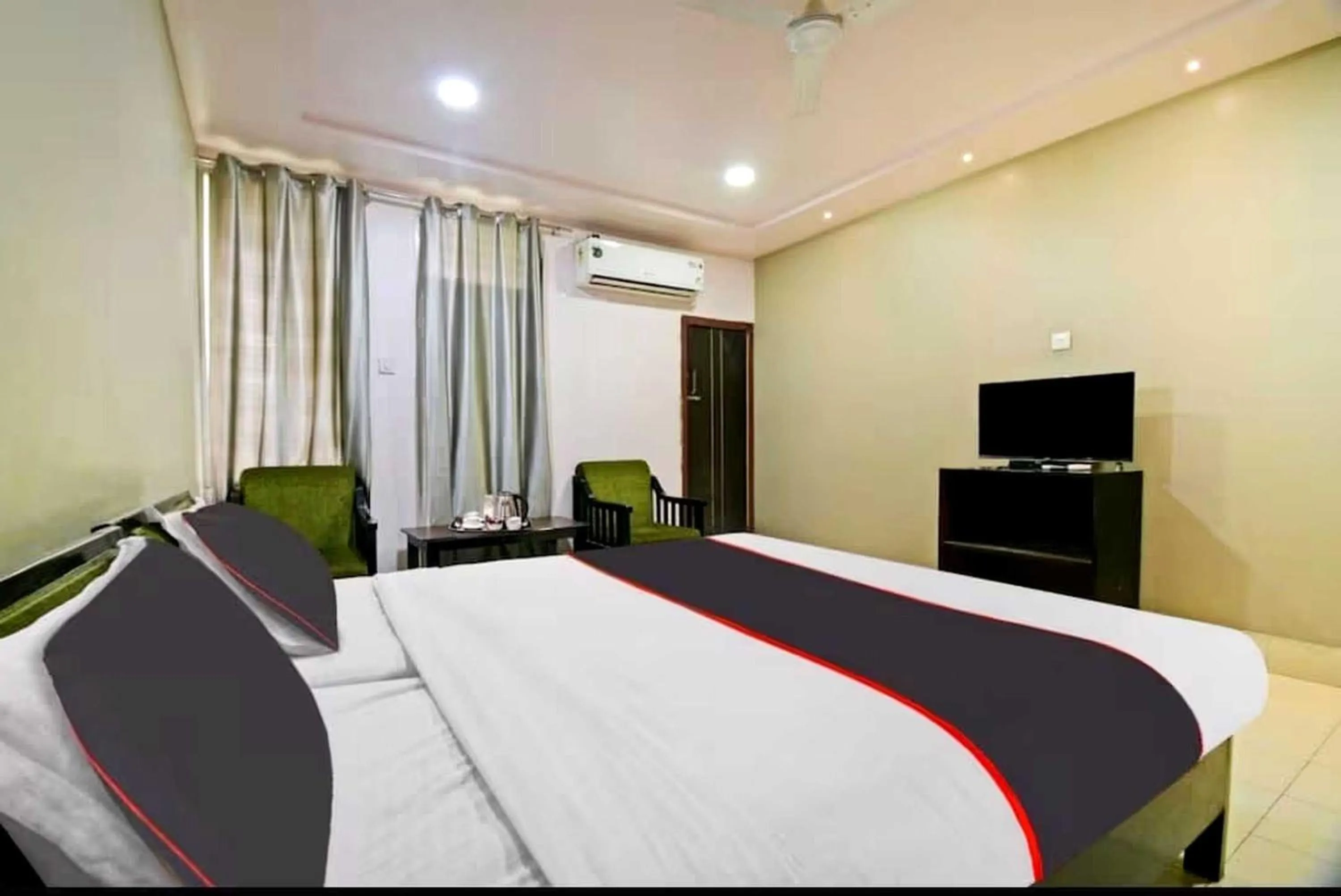 Bedroom in Collection O Megha Resort