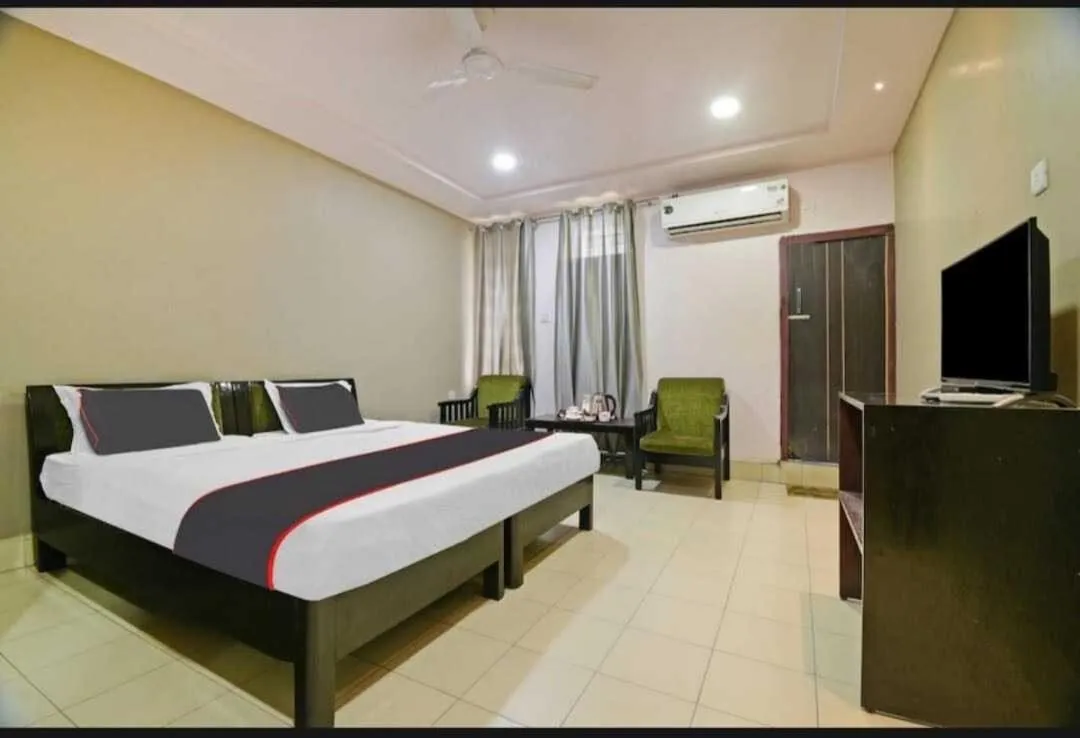 Bedroom in Collection O Megha Resort